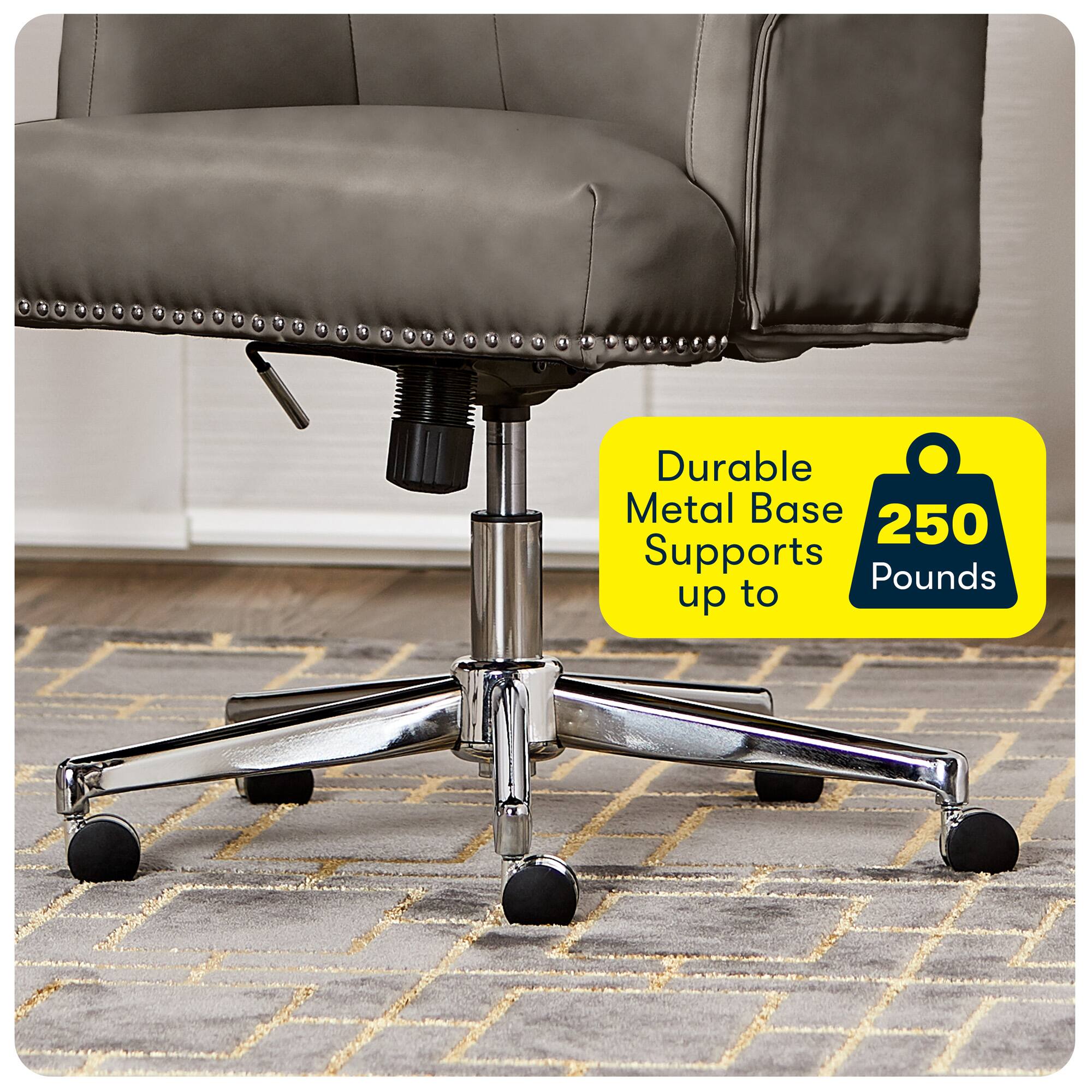 The image features a black office chair with a metal base that is durable and supports up to 250 pounds. The chair is placed on a carpeted floor, and the metal base is prominently visible, providing stability and strength to the chair. The chair appears to be well-designed and suitable for heavy use in an office setting.
