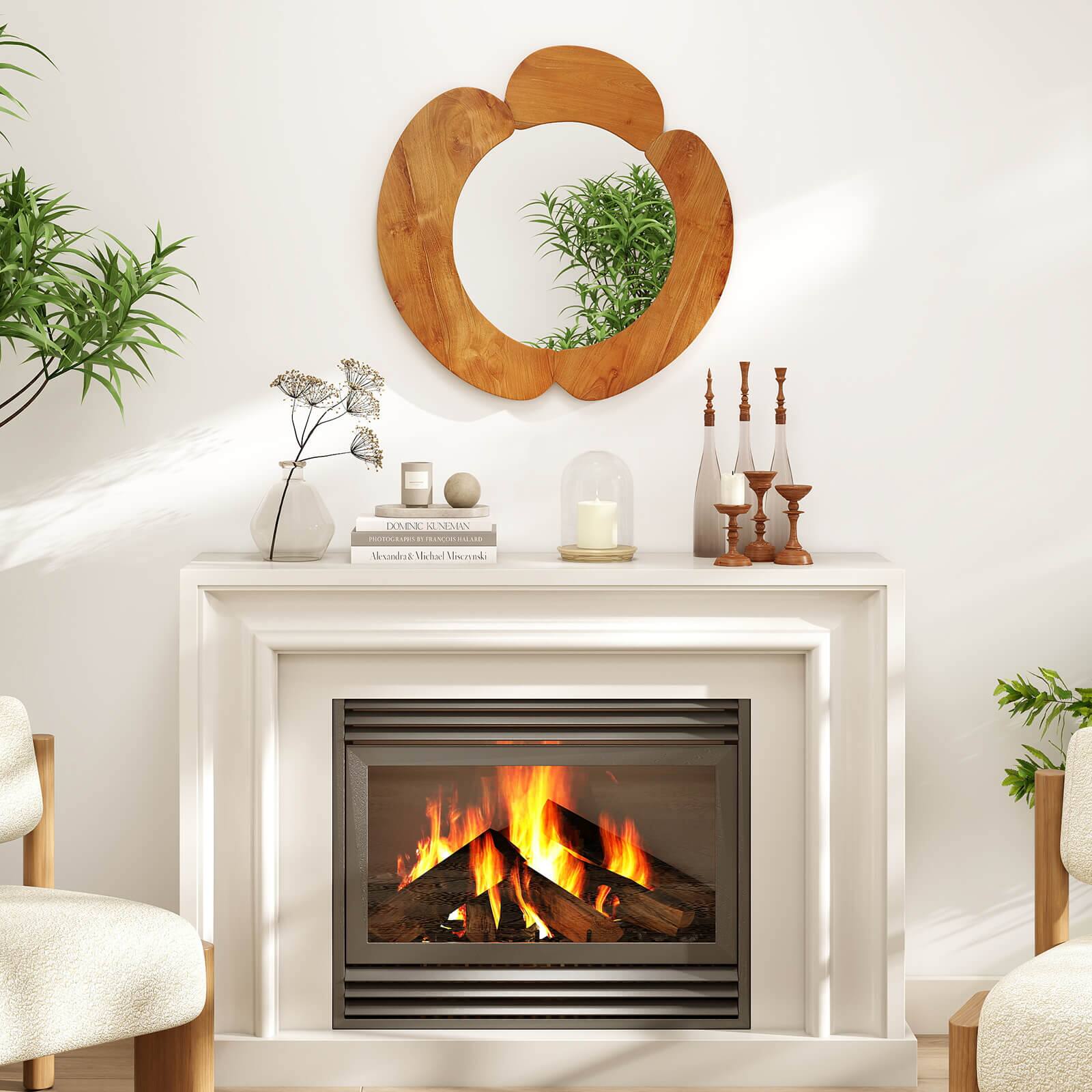 Sure, here is the corrected and grouped text from the image:

**Books:**
- DANIEL KINNEMAN
  - PHOTOGRAPHY IS MY PASSION
- Alexander McQueen

**Candle:**
- (No visible text)

**Decorative Items:**
- (No visible text)

**Mirror:**
- (No visible text)