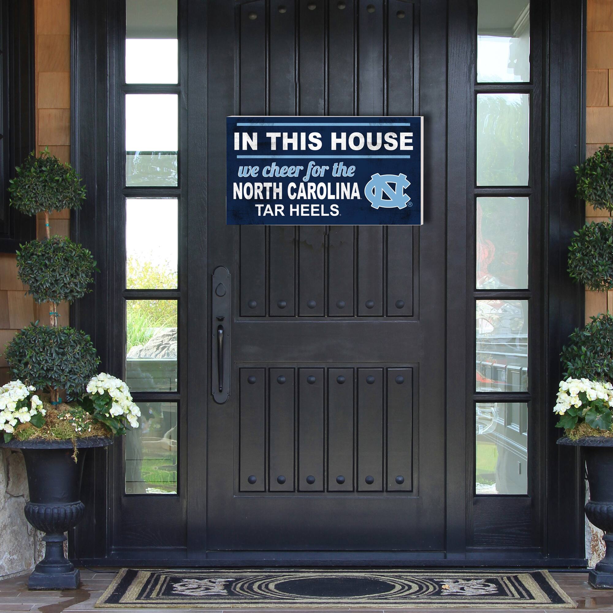 IN THIS HOUSE  
we cheer for the  
NORTH CAROLINA  
TAR HEELS