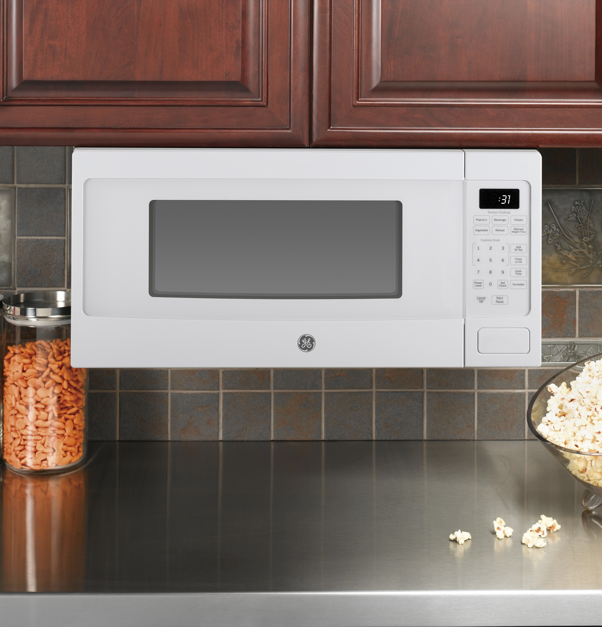 GE Profile Series 1.1 Cu. Ft. Mid-Size Microwave White on White
