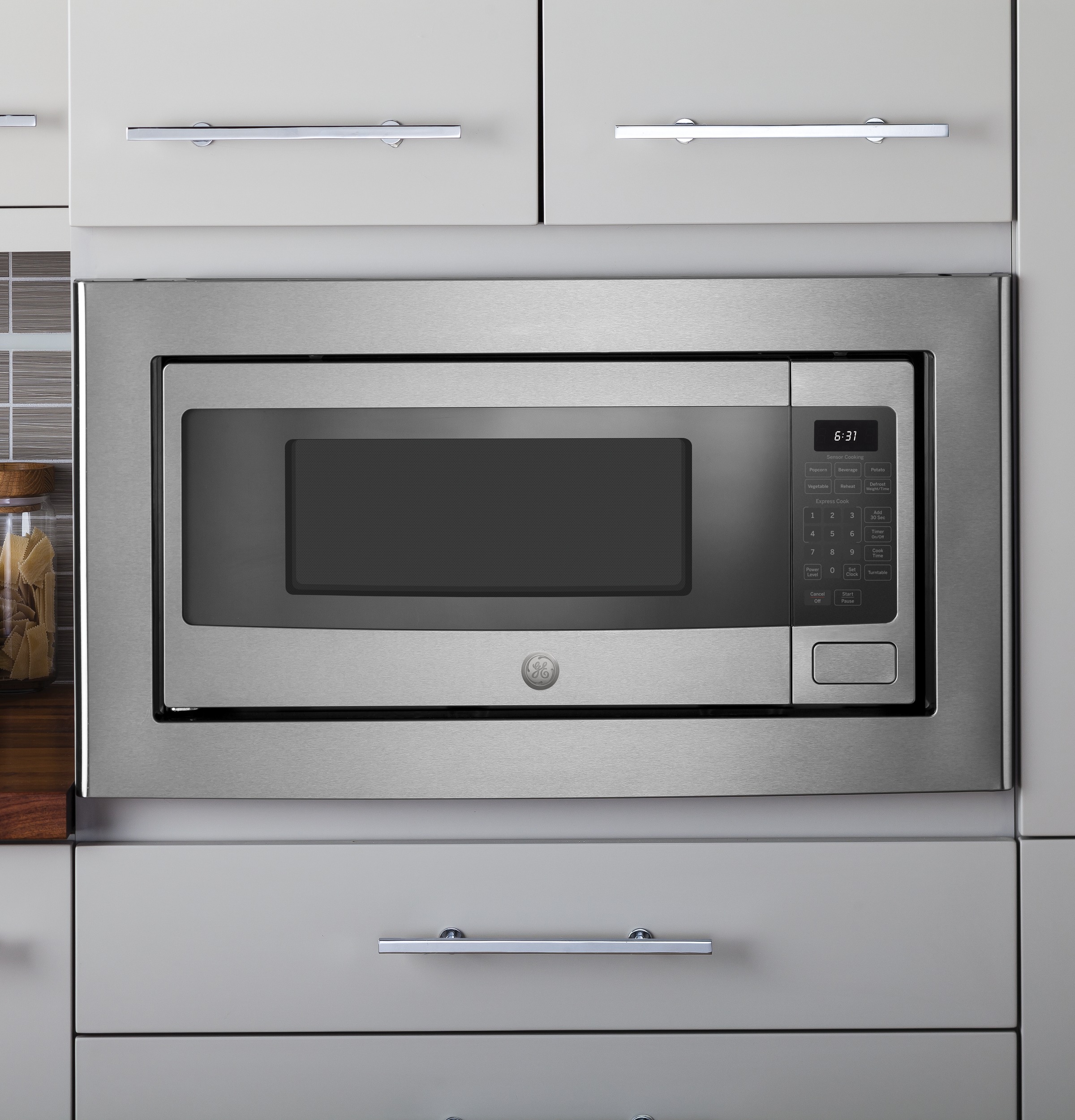 GE Profile Series 1.1 Cu. Ft. Mid-Size Microwave Stainless steel