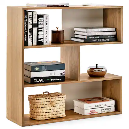 The image features a wooden bookshelf filled with various books and other items. The books are arranged in different positions, with some standing upright and others lying horizontally. There is also a basket placed on the shelf, adding a touch of practicality to the display. The bookshelf is situated in a room, possibly a living room or a study, and it serves as a focal point for the space. The collection of books and other items on the shelf creates an inviting and cozy atmosphere, reflecting the interests and personality of the person who owns the bookshelf.