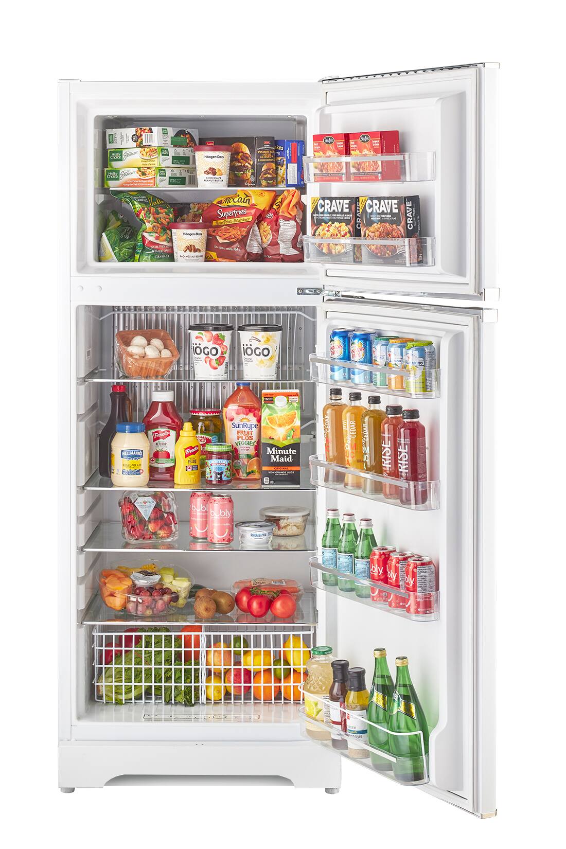 The refrigerator is filled with a variety of food and drinks. There are several bottles of juice, including Minute Maid, and a variety of other drinks such as soda. The refrigerator also contains a selection of fruits, including apples and oranges. There are also multiple bottles of sauces and condiments, such as ketchup and mustard. The refrigerator is well stocked with a wide range of items to choose from.