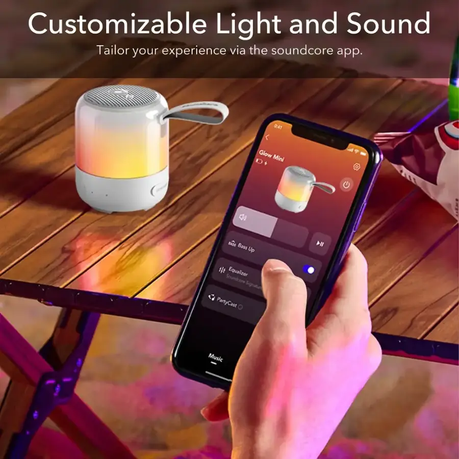 Customizable Light and Sound: Tailor your experience via the Soundcore app. 9:41 Glow Mini s atl  Bass Up I4 Equalizer Soundcore Signature PartyCast Music.