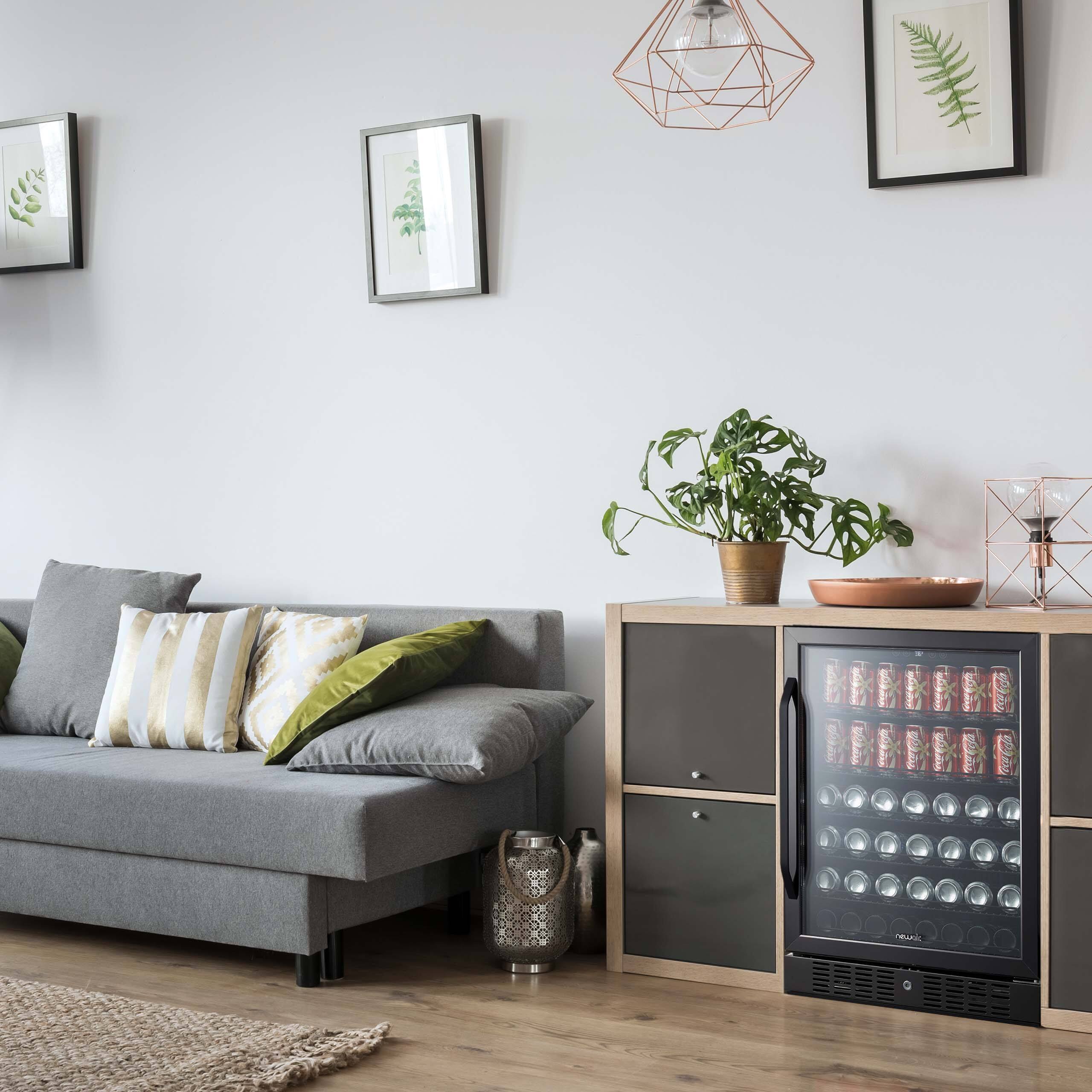 Left. NewAir - 24” 177-Can Built-In Beverage Cooler with Precision Temperature Controls and Adjustable Shelves - Black stainless steel.