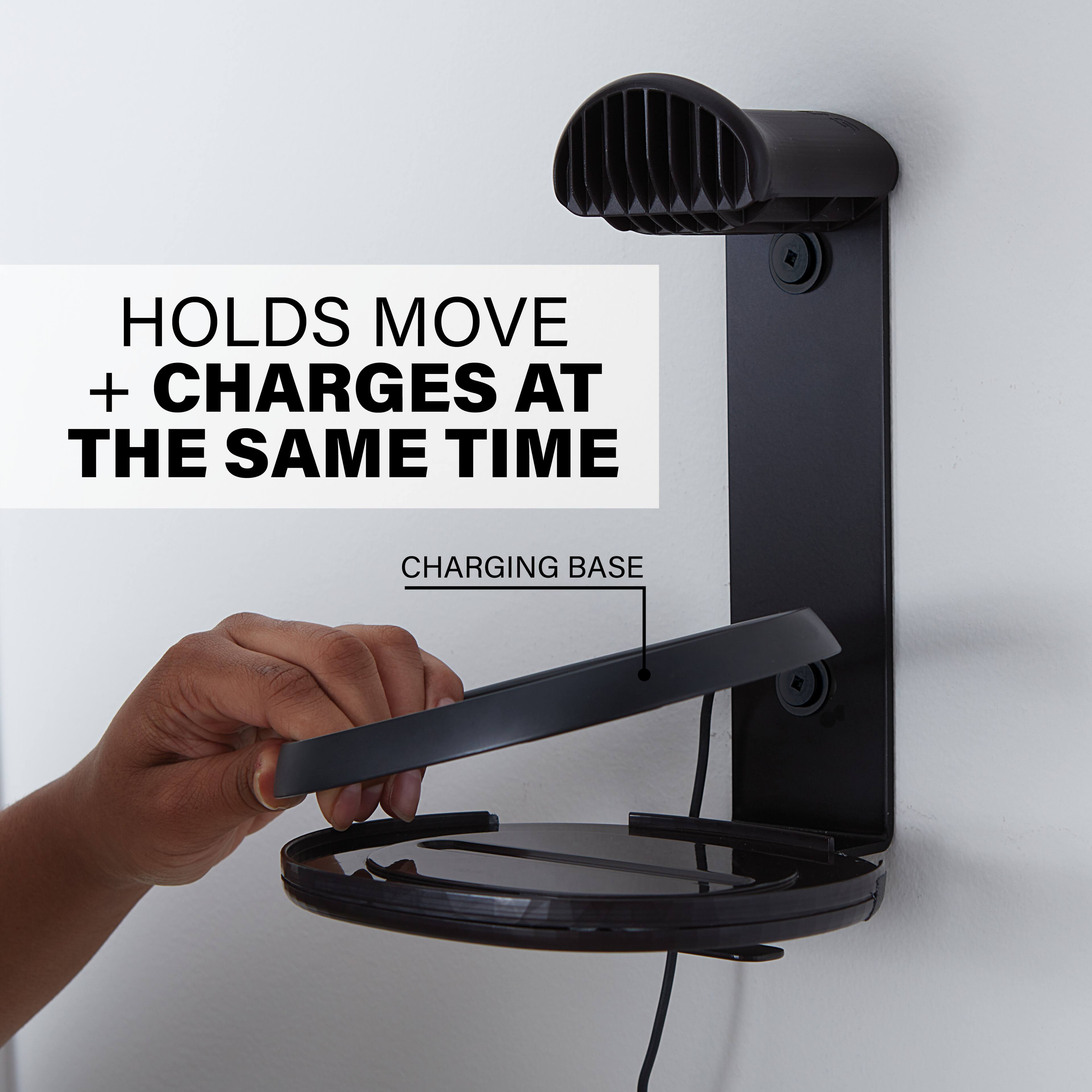 The text on the image reads: "Holds Move + Charges at the Same Time Charging Base."