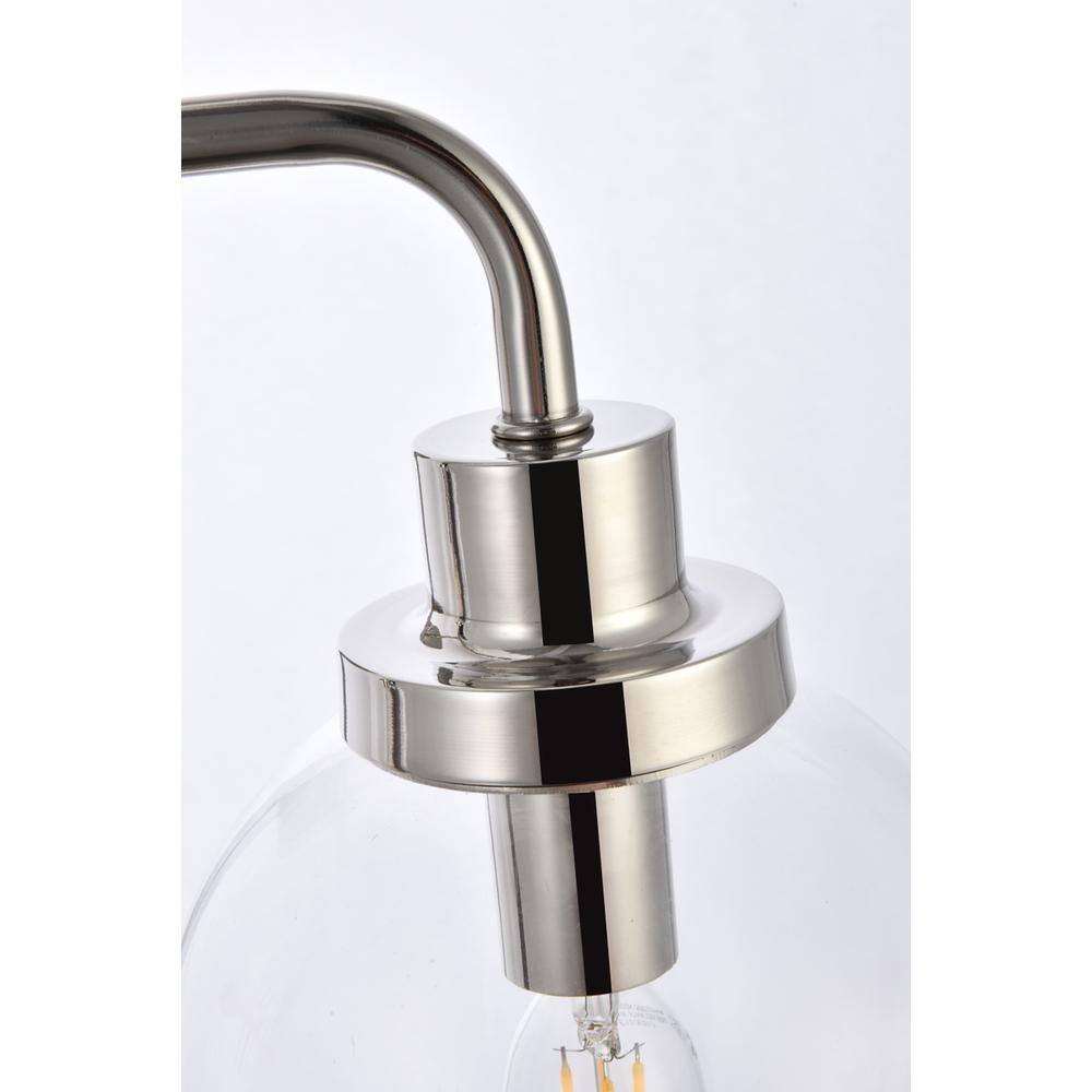 Left. Living District - Hanson 3 lights bath sconce in polished nickel with clear shade - Polished Nickel And Clear Shade.