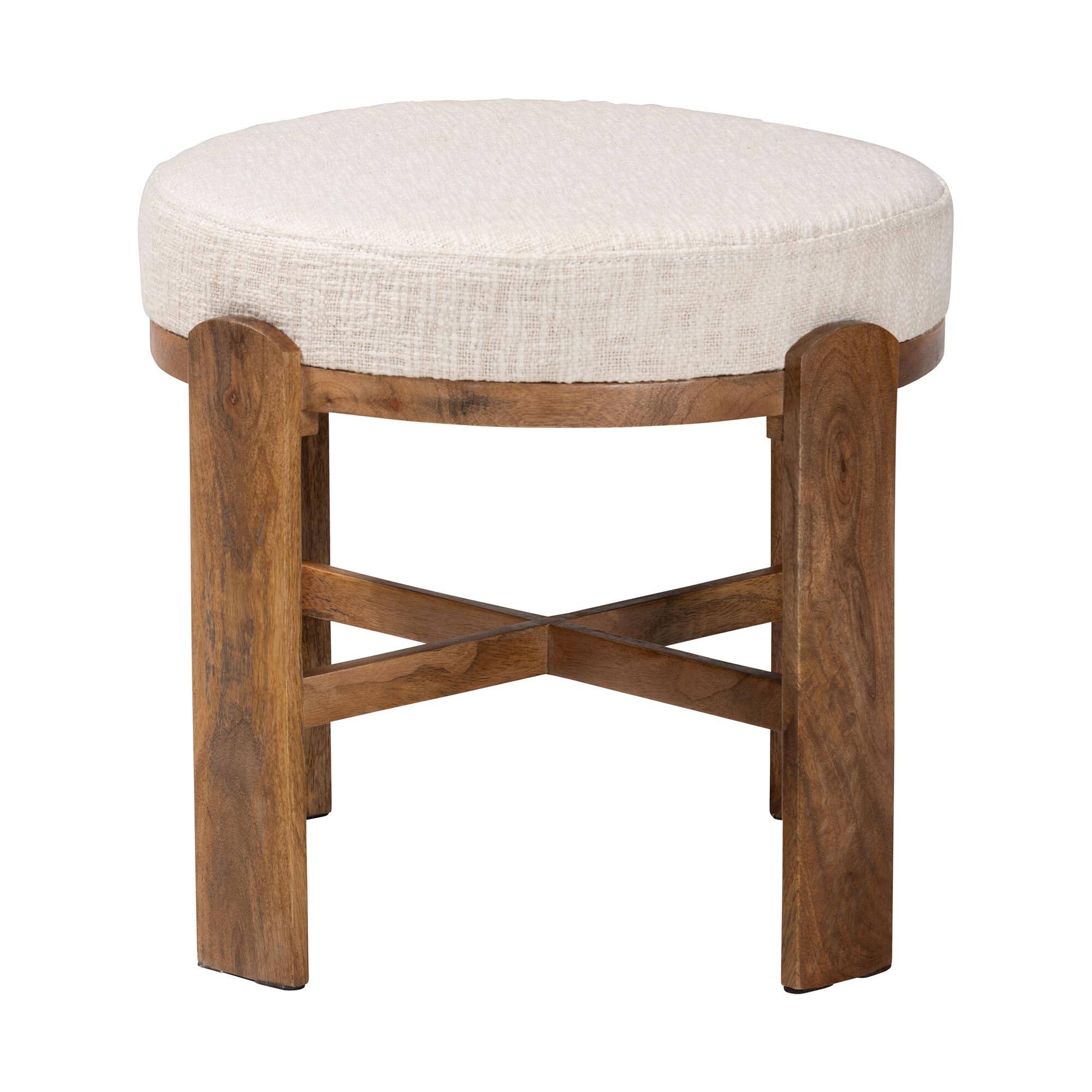 Angle. Baxton Studio - Whitfield Round Fabric Ottoman Stool - Modern Accent Seating or Footstool with Upholstered Cushion and Mango Wood Frame - Ivory/Walnut Brown.