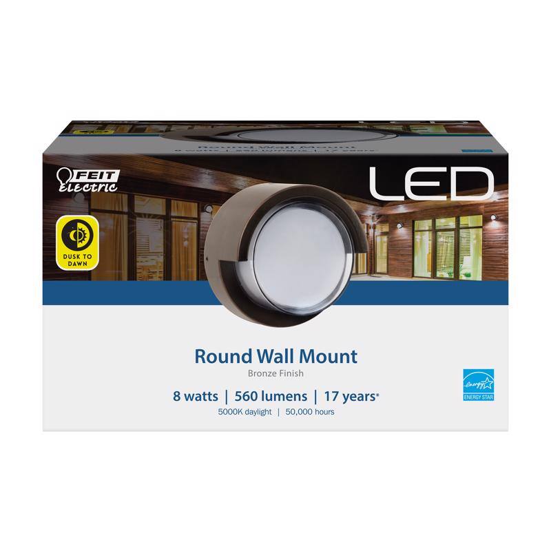 FEIT Electric LED Dusk to Dawn Round Wall Mount Bronze Finish  
8 watts | 560 lumens | 5000K daylight | 50,000 hours | 17 years*  
ENERGY STAR
