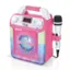 The image features a pink and white portable speaker with a built-in microphone. The speaker is designed for karaoke and has a clock on it. The microphone is attached to the speaker, making it a convenient and portable setup for singing and entertainment.