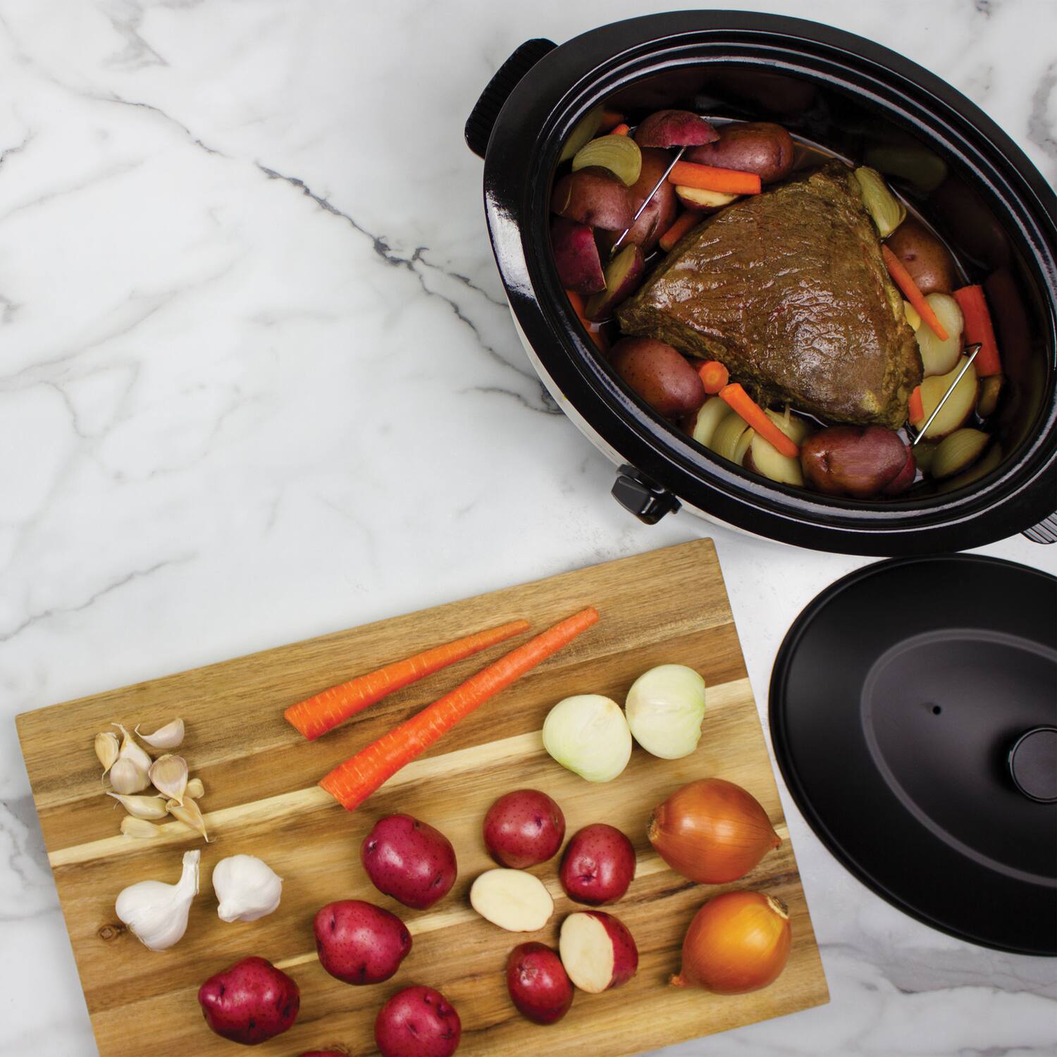 Left. Nesco - Nesco 4816-25 6-qt. 750-watt Roaster With Porcelain Cookwell (silver) - silver.