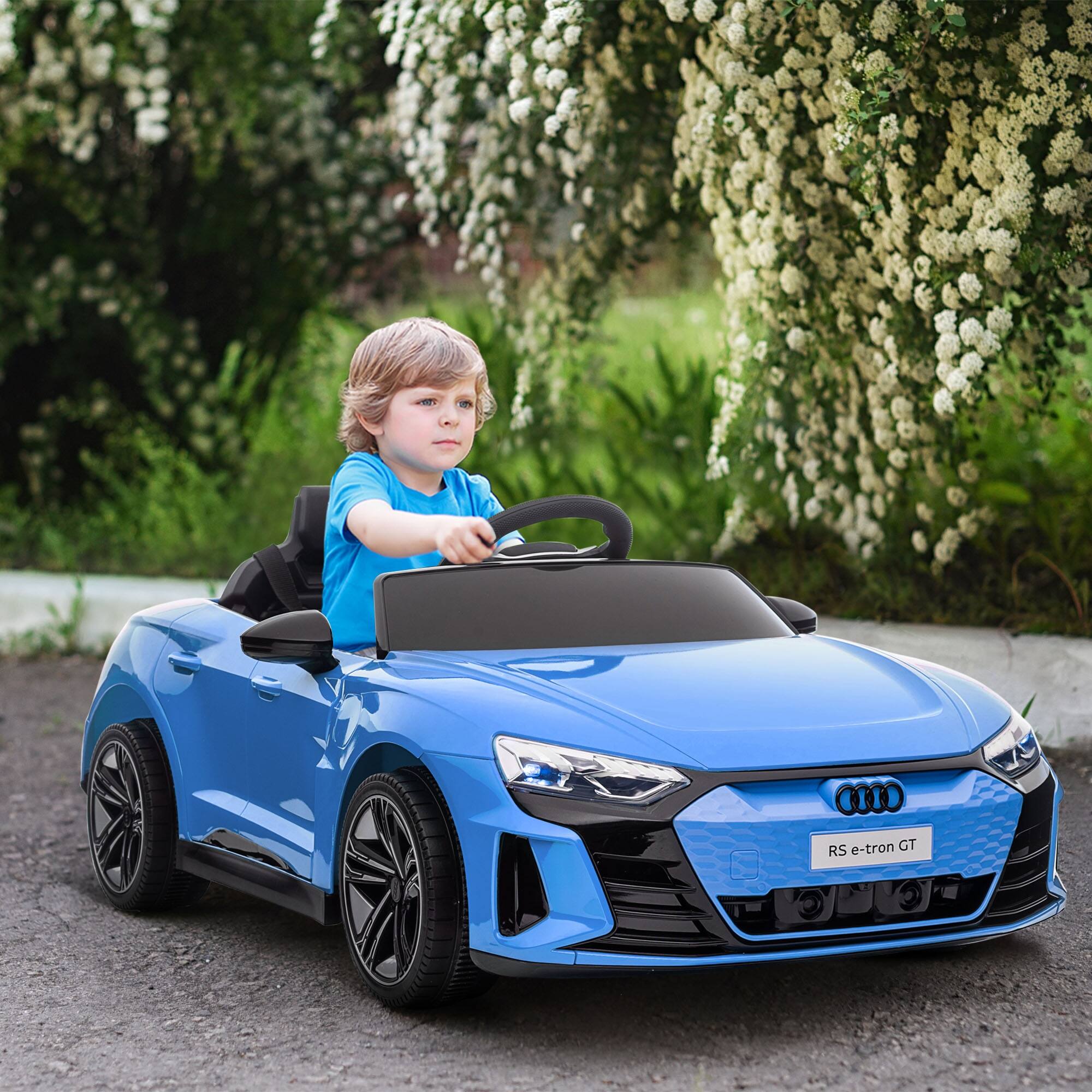Angle. Aosom - Kids Ride on Car, 12V Licensed Audi RS E-tron GT 3.1 MPH Electric Car with Remote, 4 Wheels, Suspension, Horn, Music.