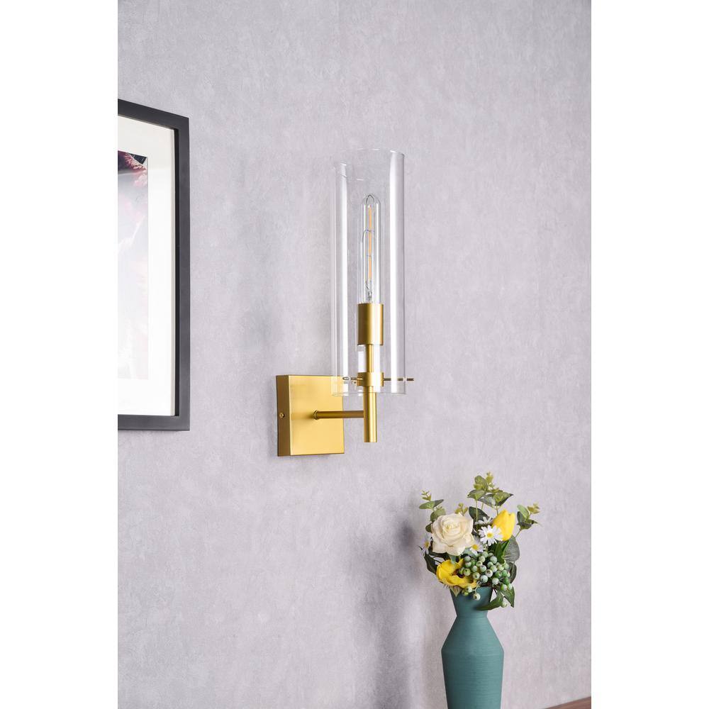 Angle. Living District - Savant 1 light brass wall sconce - Brass And Clear.