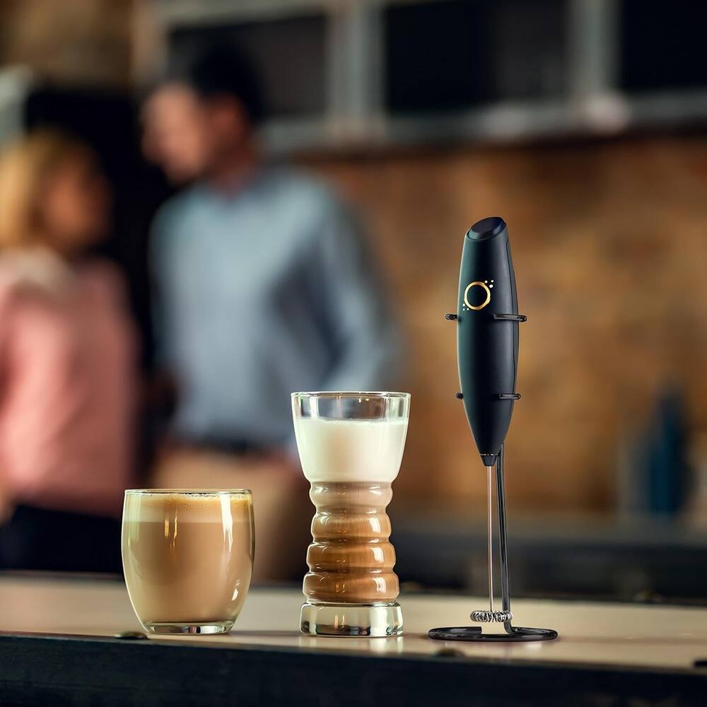 Left. ACJPR - Handheld Milk Frother with Electric Whisk, 19,000 RPM, Includes Stainless Steel Stand and Recipe Book - Matte.