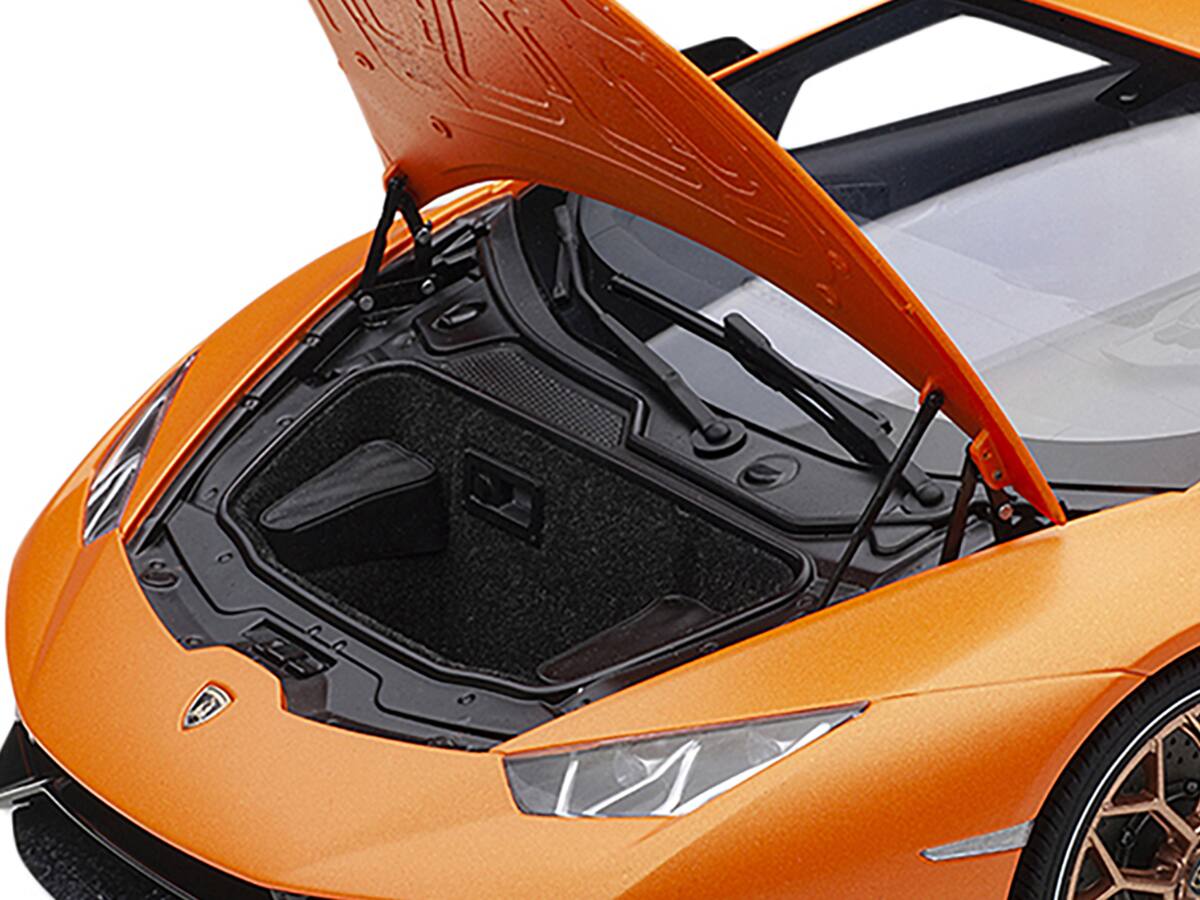 Left. Autoart - Lamborghini Huracan Performante Arancio Anthaeus / Matt Orange with Copper Wheels 1/12 Model Car by Autoart - Matt Orange With Copper.