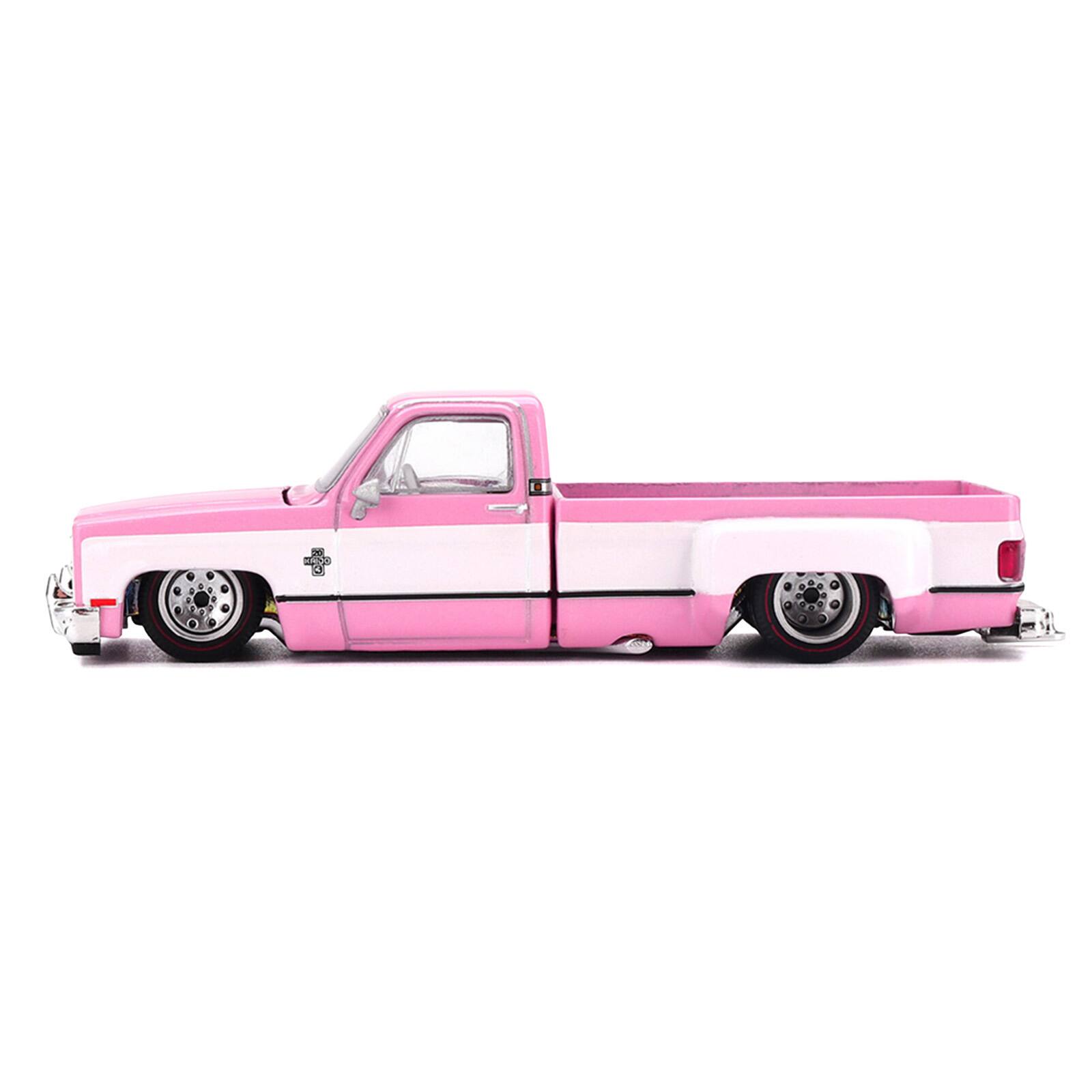 Alt View 2. True Scale Miniatures - Chevrolet Silverado Dually Pickup Truck "Vintage Spec V2" Pink & White "Kaido House" 1/64 Diecast Model Car by Mini GT.