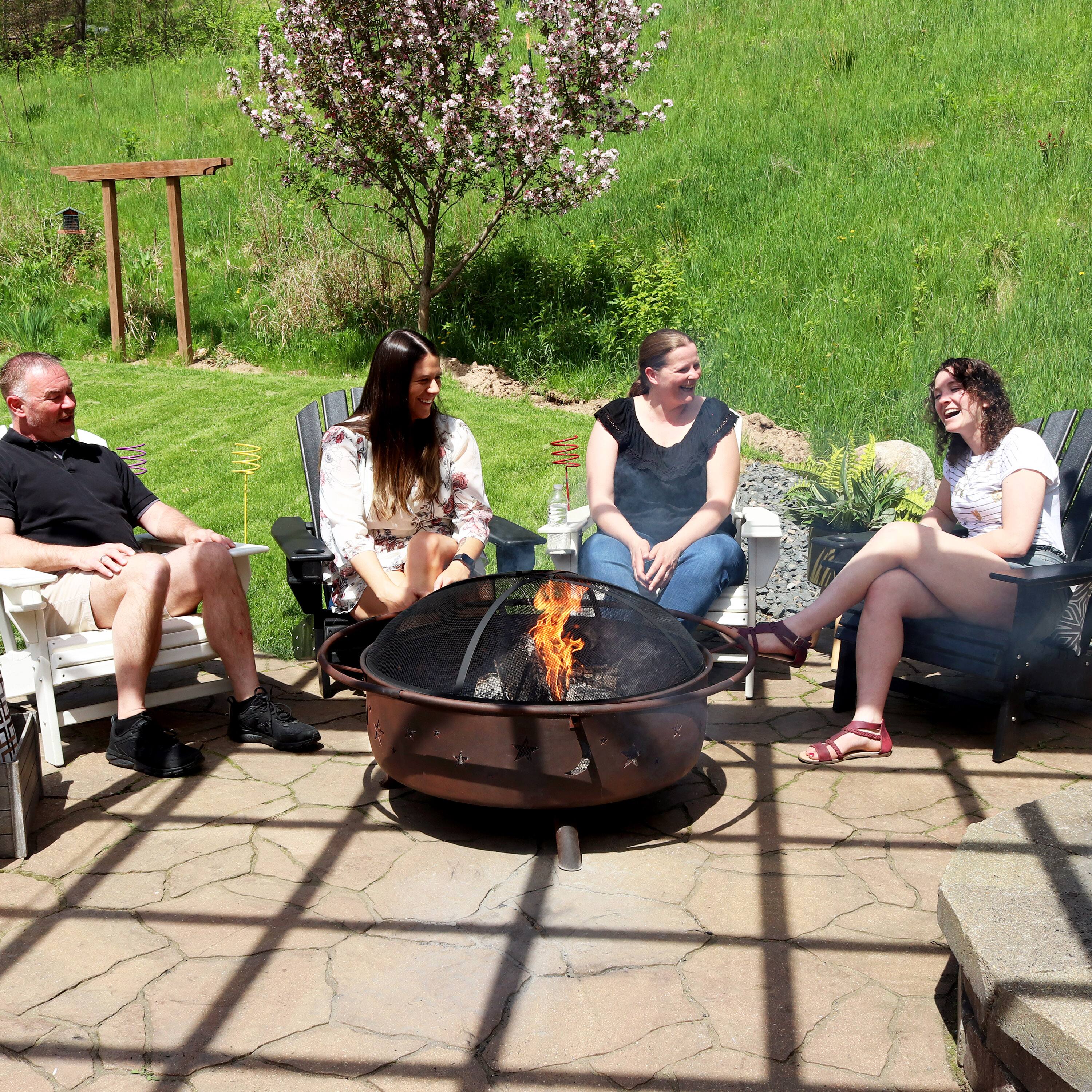 Alt View 9. Sunnydaze - 42 in Cosmic Steel Fire Pit with Spark Screen and Poker - Bronze.