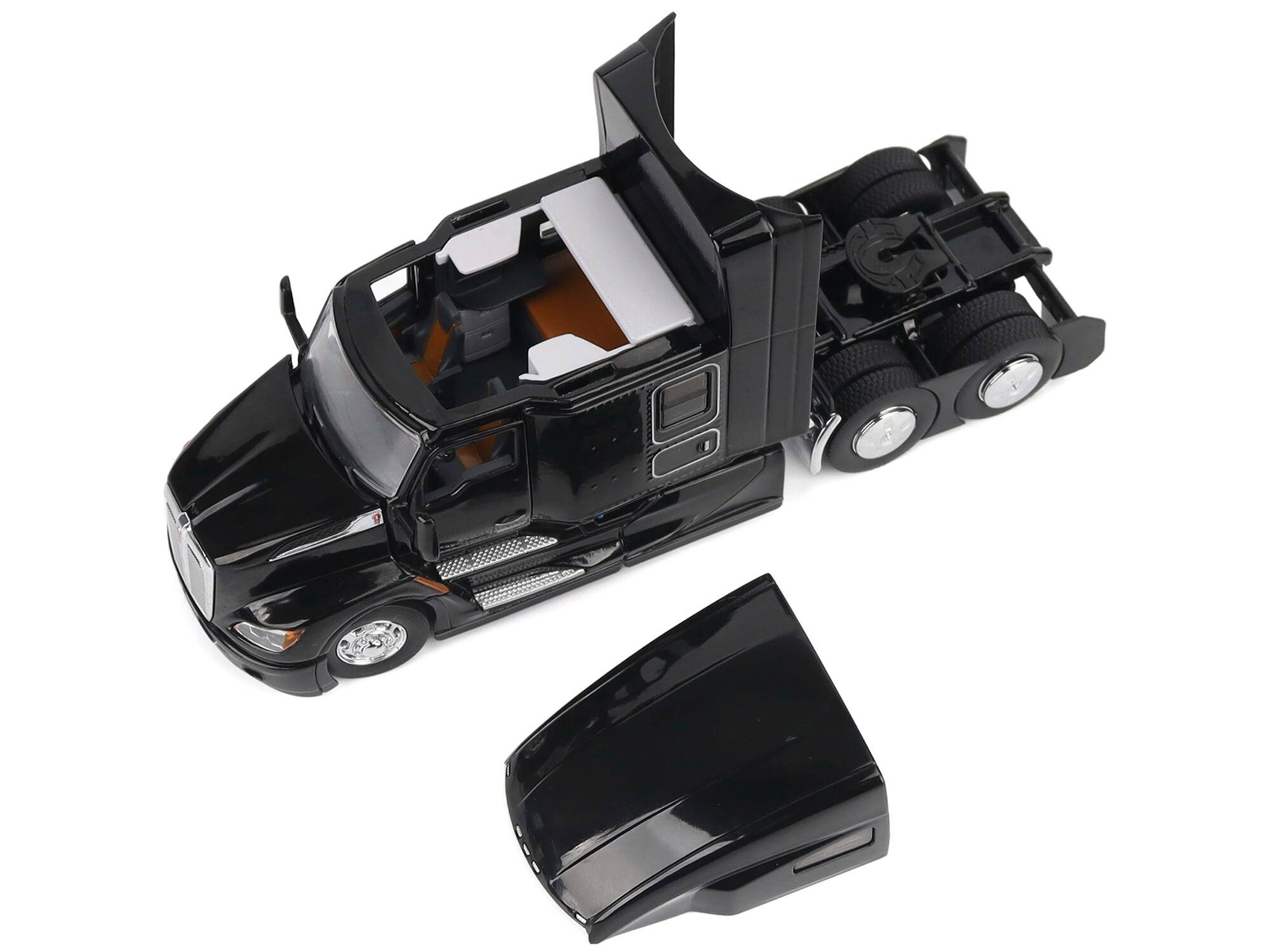 Left. Diecast Masters - Kenworth T680 76" High Roof Sleeper Cab Truck Tractor Black "Transport Series" 1/50 Diecast Model by Diecast Masters - Black.