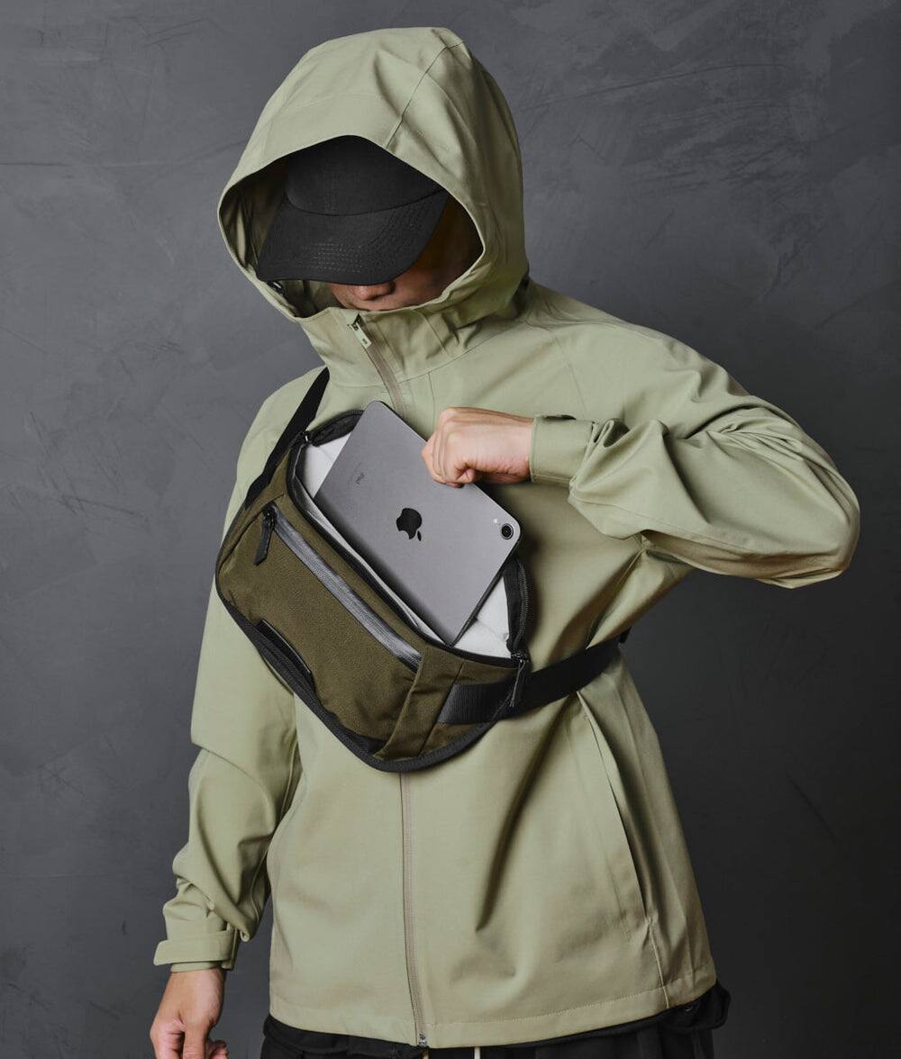 Left. ALPAKA - Sling Bag Bag for Men, Fits iPad Mini & Switch OLED, Hidden Rear Pocket, Magnetic Buckle, YKK AquaGuard Zippers - Army Green Axoflux 300D.