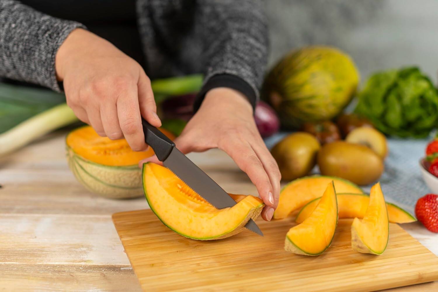 Alt View 2. Kuhn Rikon - ICED Serrated Utility Knife 5.12-Inch, Ice Hardened German Stainless Blade - Black.