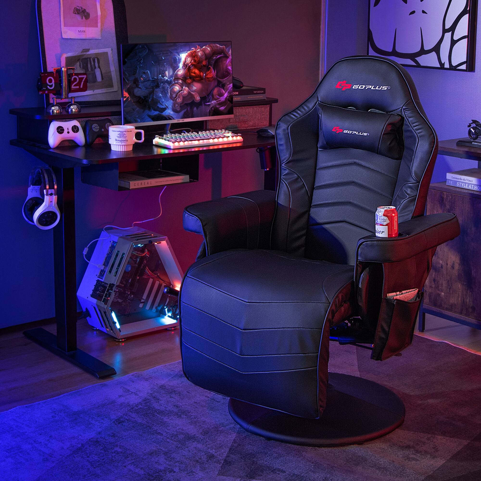 The image features a black gaming chair with a can of soda on it. The chair is positioned in front of a desk, which has a computer, keyboard, and mouse on it. There is also a TV in the background. The scene appears to be set up for a comfortable gaming session.