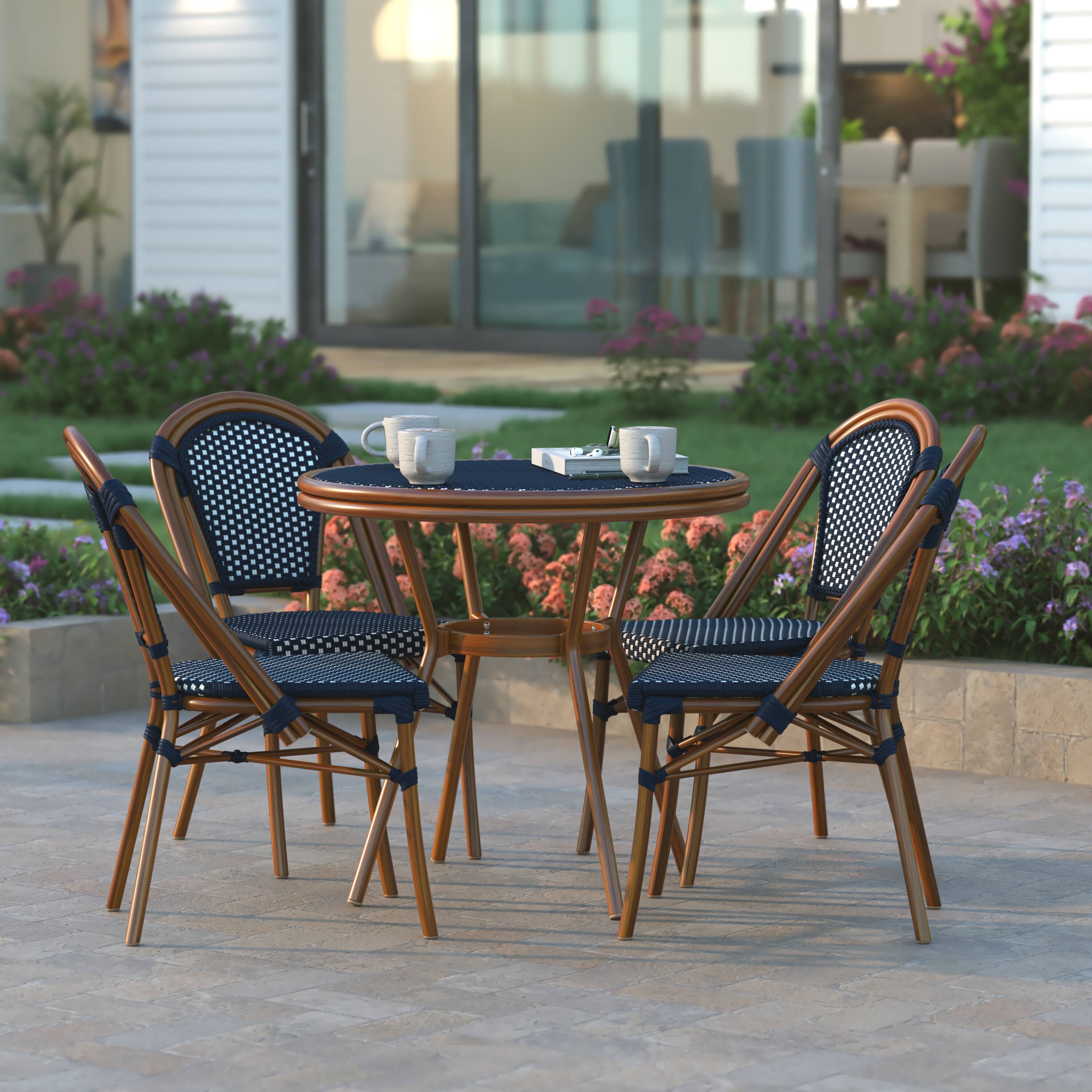Alt View 3. Emma + Oliver - Soie Indoor/Outdoor Bistro Style 31.5 in. Table with PE Rattan, Glass Top, and Four Chairs - Metal Frame - Navy & White Rattan/Natural Frame.