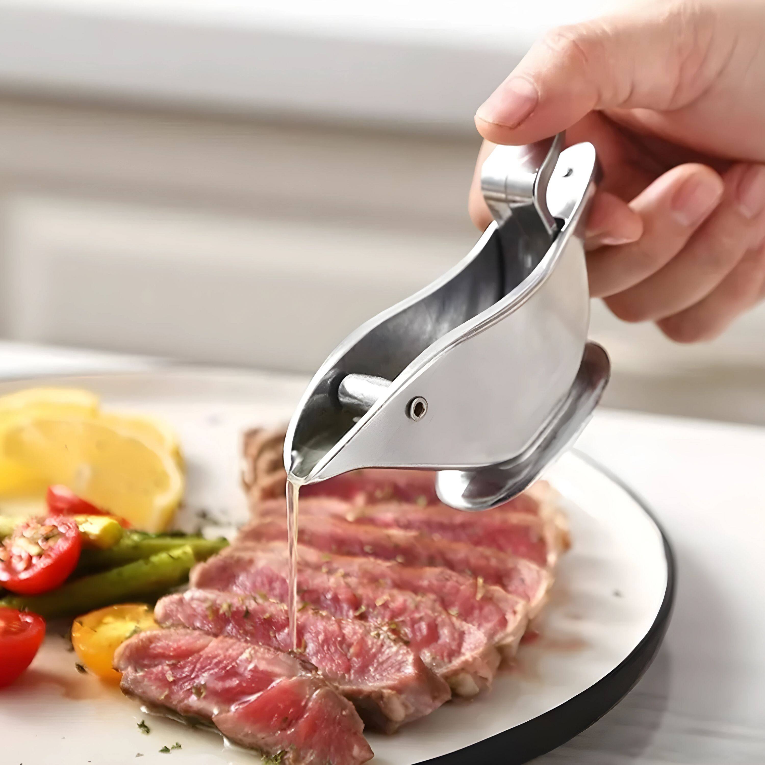 Back. Kitcheniva - Stainless Steel Portable Handheld Lemon Squeezer - Silver.