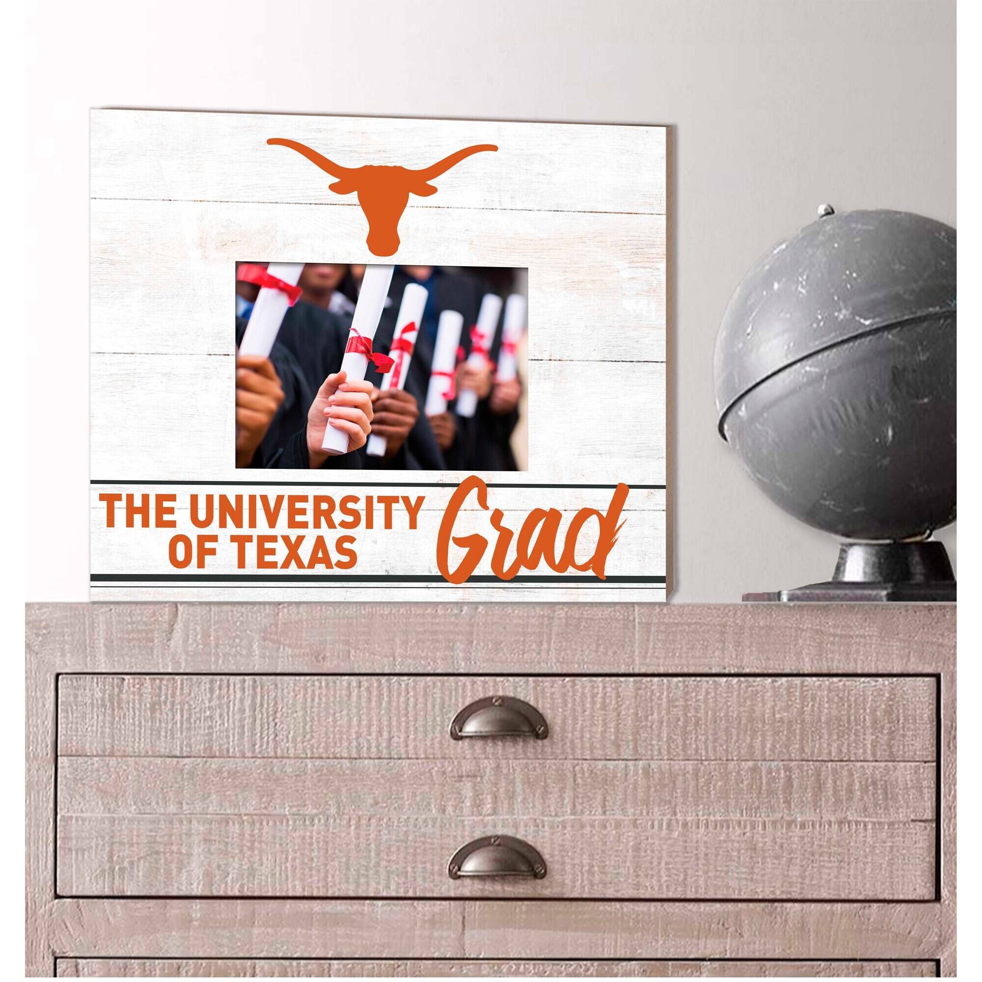 THE UNIVERSITY OF TEXAS  
Grad