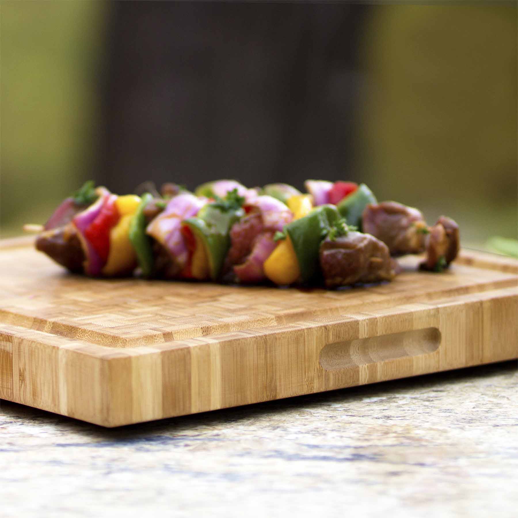 Left. Totally Bamboo - Pro Board End-Grain Carving Board, 16" x 16" x 2".