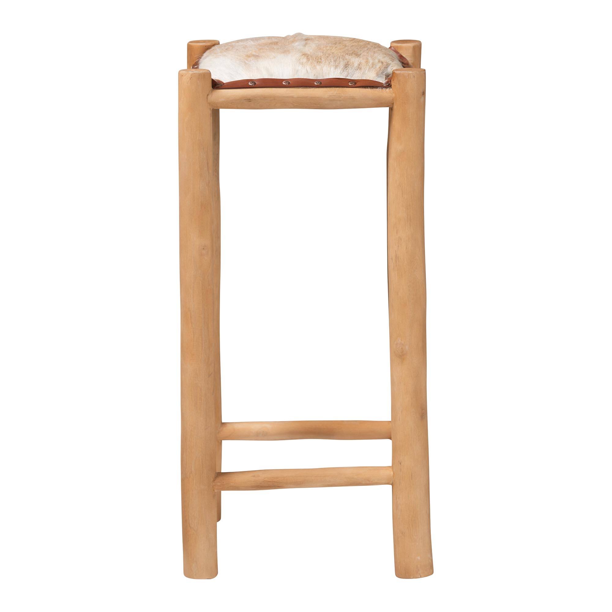 Angle. bali & pari - Rivera Genuine Goat Leather Bar Stool - Rustic Boho Seating with Teak Wood Frame and Natural Hide Upholstery - Natural Brown/Teak Brown.