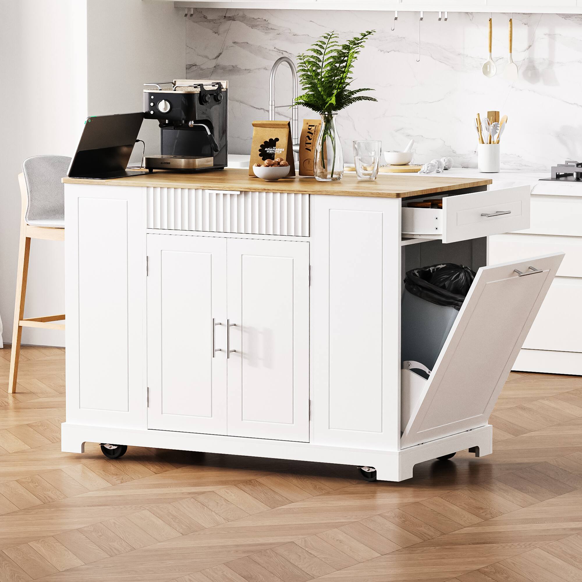 Angle. GOODSILO - Kitchen Island with Trash Can Storage, Power Outlet, Rolling Wheels, 3 Drawers & Open Shelves - White.