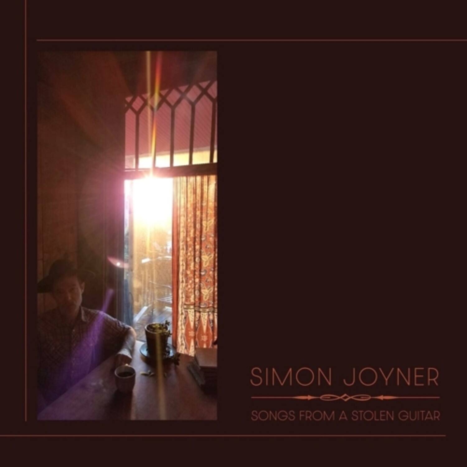 SIMON JOYNER  
SONGS FROM A STOLEN GUITAR
