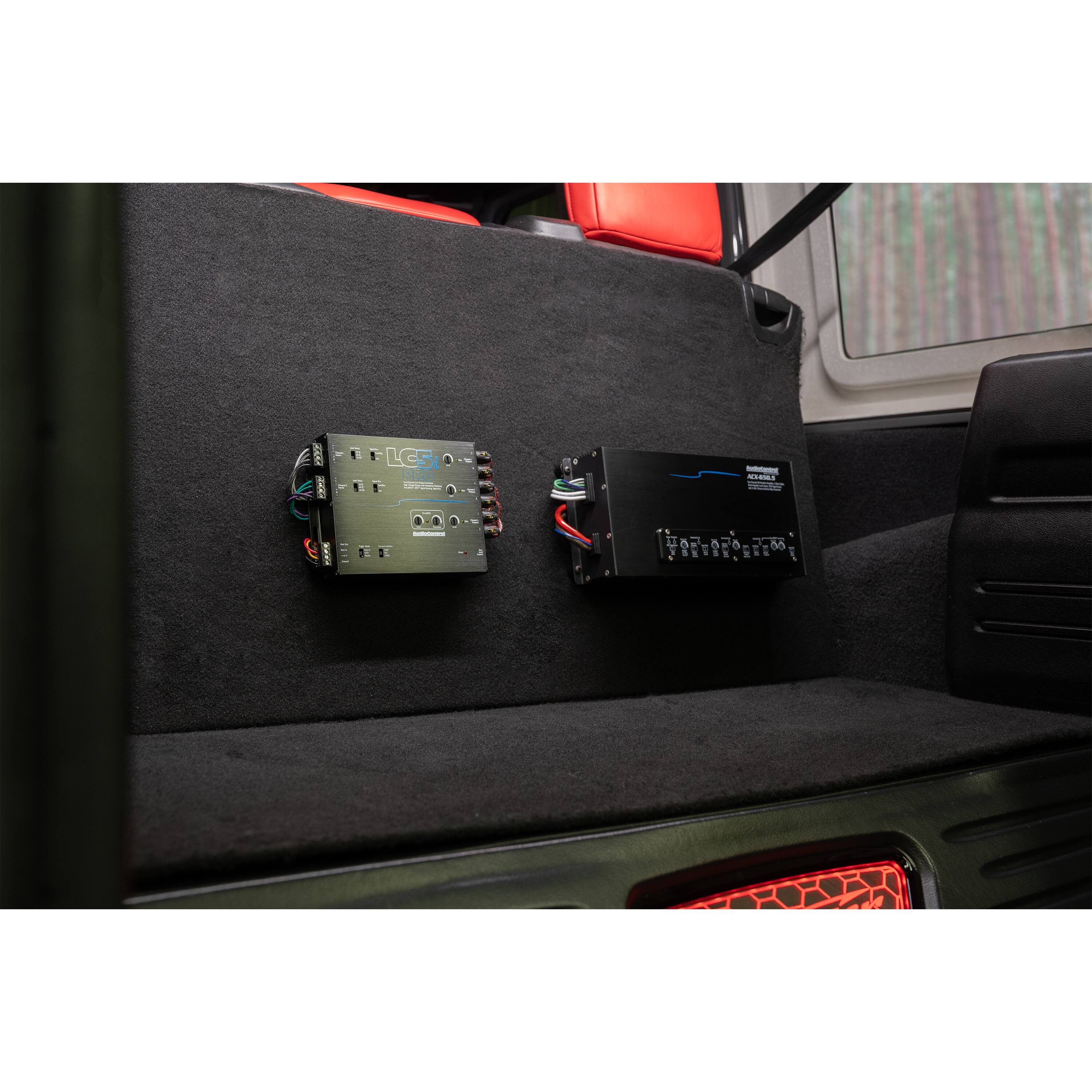 The text on the image reads "KLCS 2RO - C FDer I u . 5 o 1 1 & . I 4 do." However, it is not clear what this text represents or its significance. It could be a code, a message, or a description of the equipment in the vehicle.