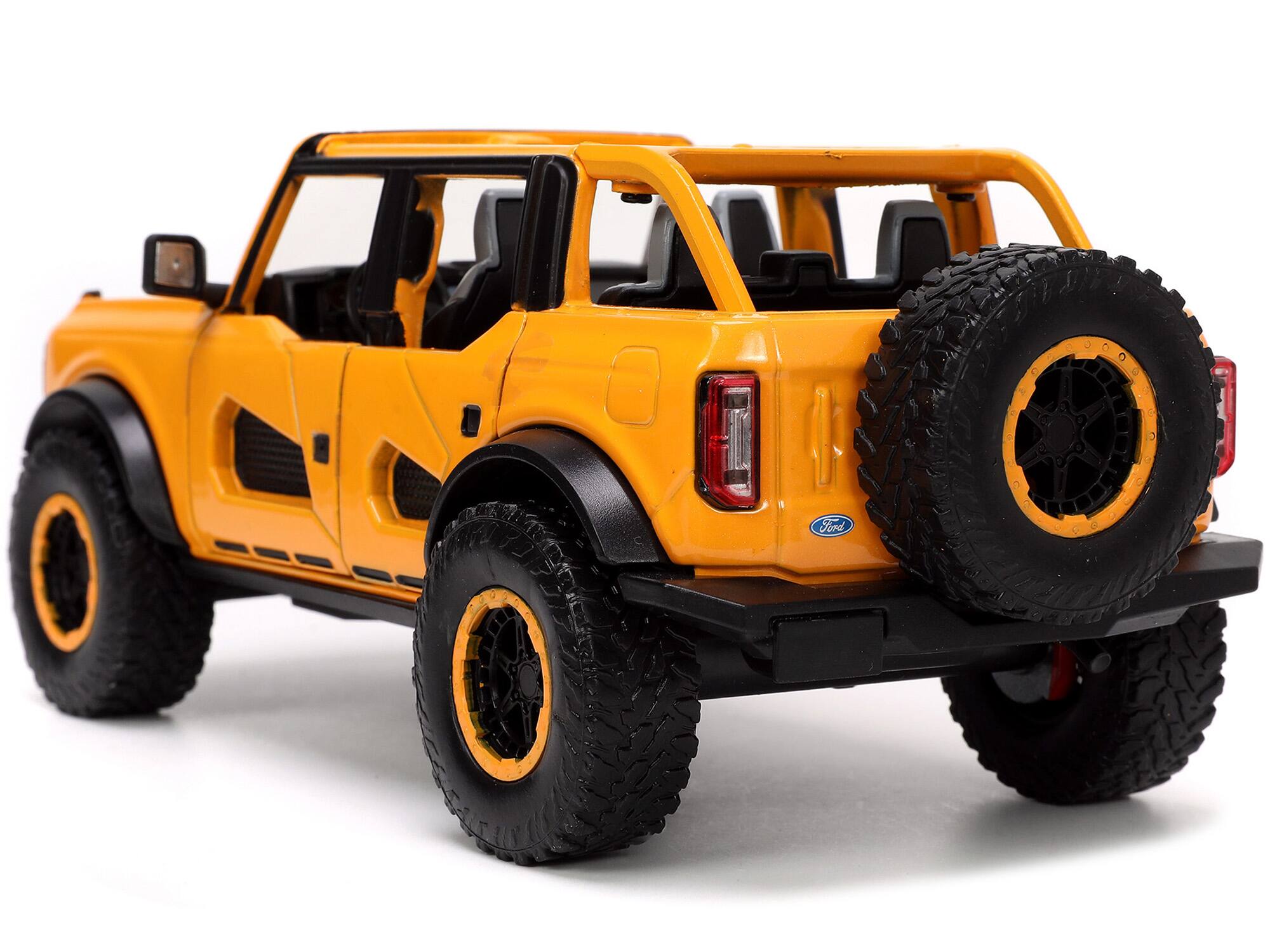 Alt View 3. Jada - 2021 Ford Bronco Orange Metallic with Extra Wheels "Just Trucks" Series 1/24 Diecast Model Car by Jada.