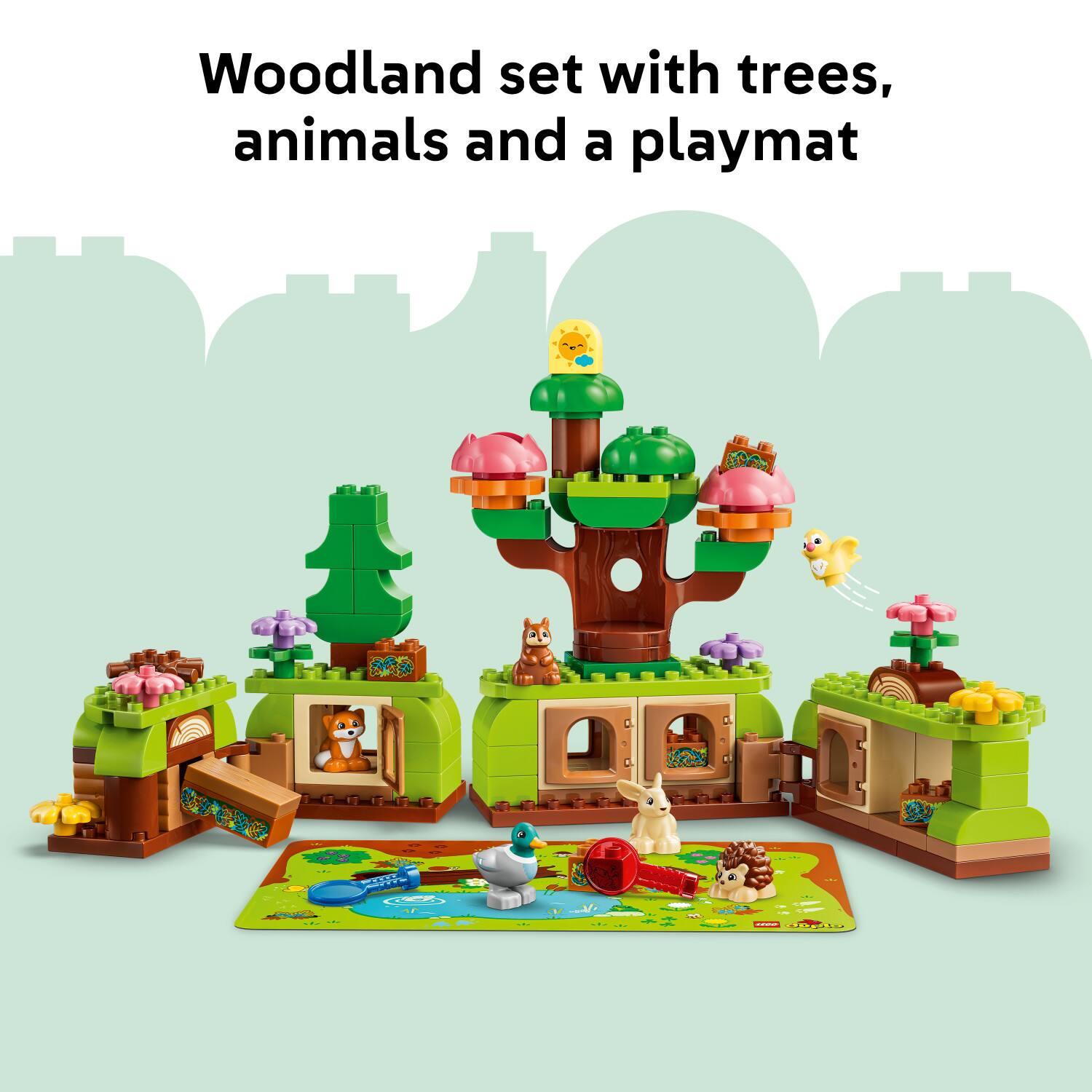 Woodland set with trees, animals and a playmat