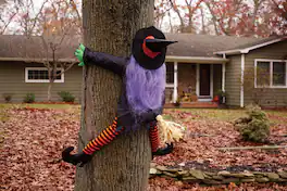 Funworld - Wrong Way Witch Halloween Décor Tree Hugger - Purple