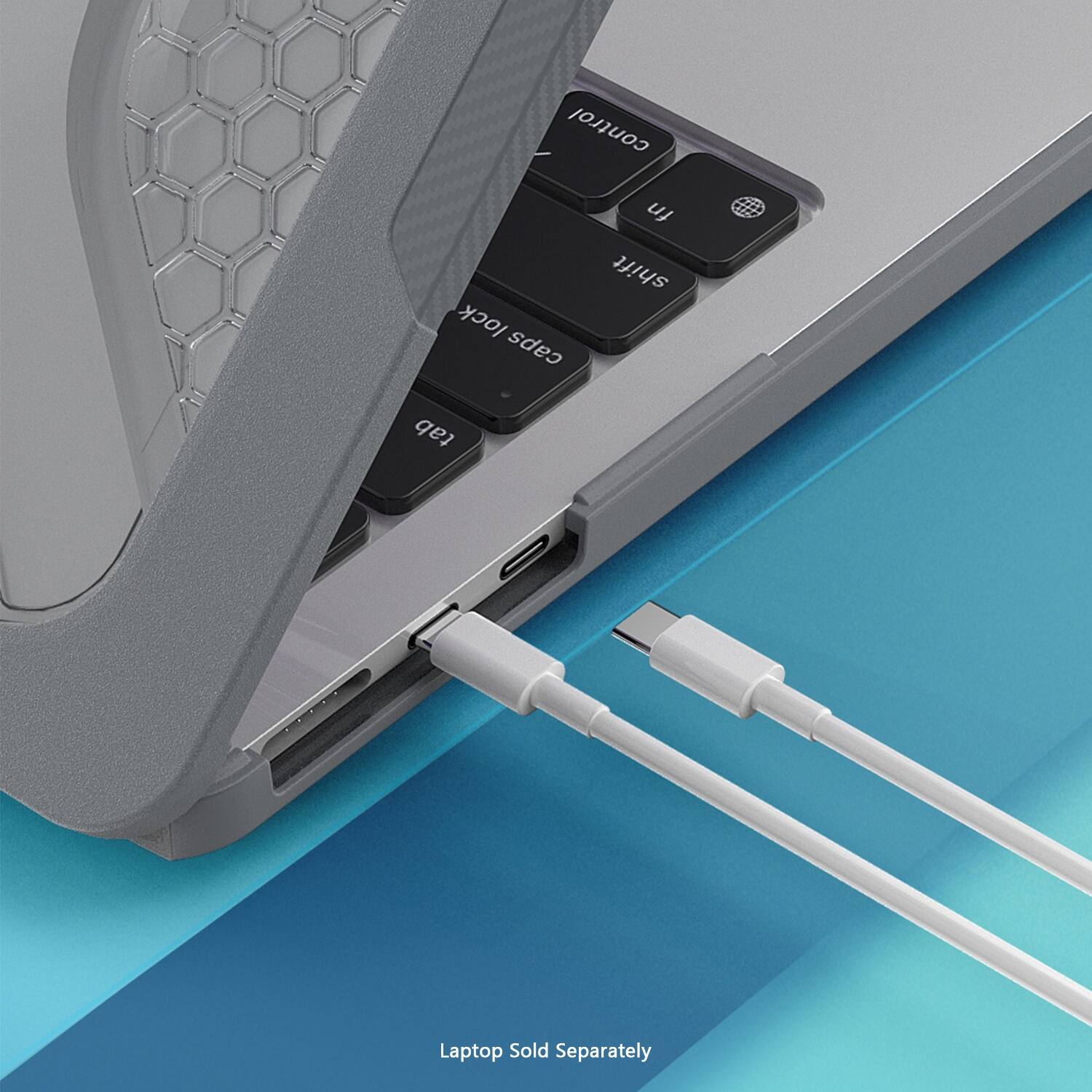 The text on the image reads: "control lock caps fn shift tab I Laptop Sold Separately."