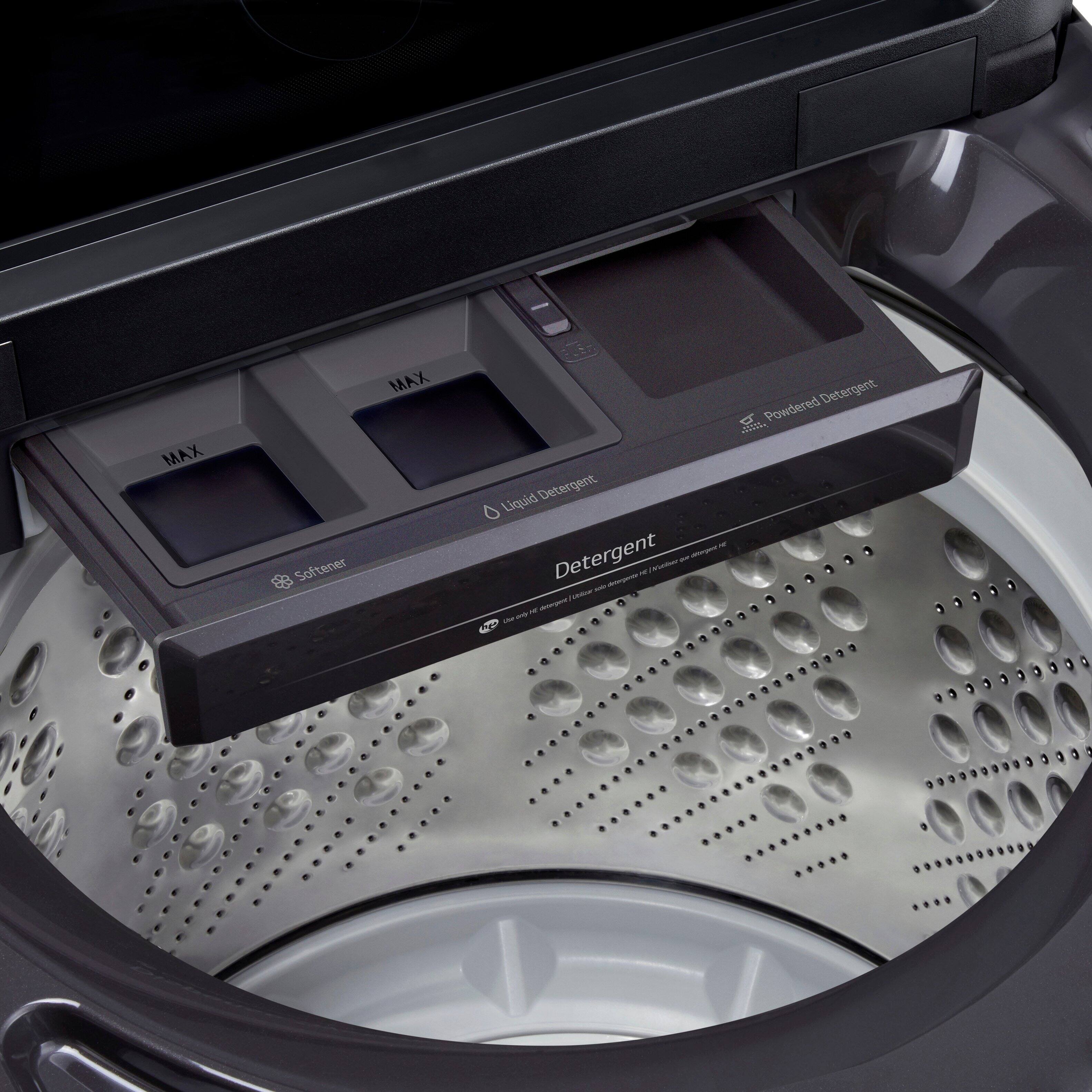 The image shows a washing machine with a compartment for detergent. The compartment is filled with two containers of detergent, one of which is a liquid detergent and the other is a powdered detergent. The detergent compartment is designed to hold these containers securely and safely during the washing process.