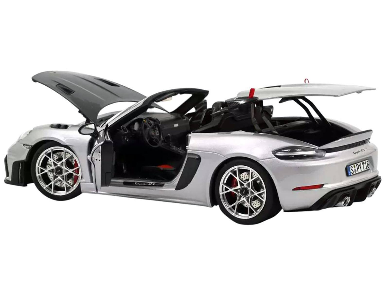 Angle. Norev - 2023 Porsche 718 Spyder RS Weissach Pack GT Silver Metallic with Carbon Hood 1/18 Diecast Model Car by Norev - Silver Metallic.