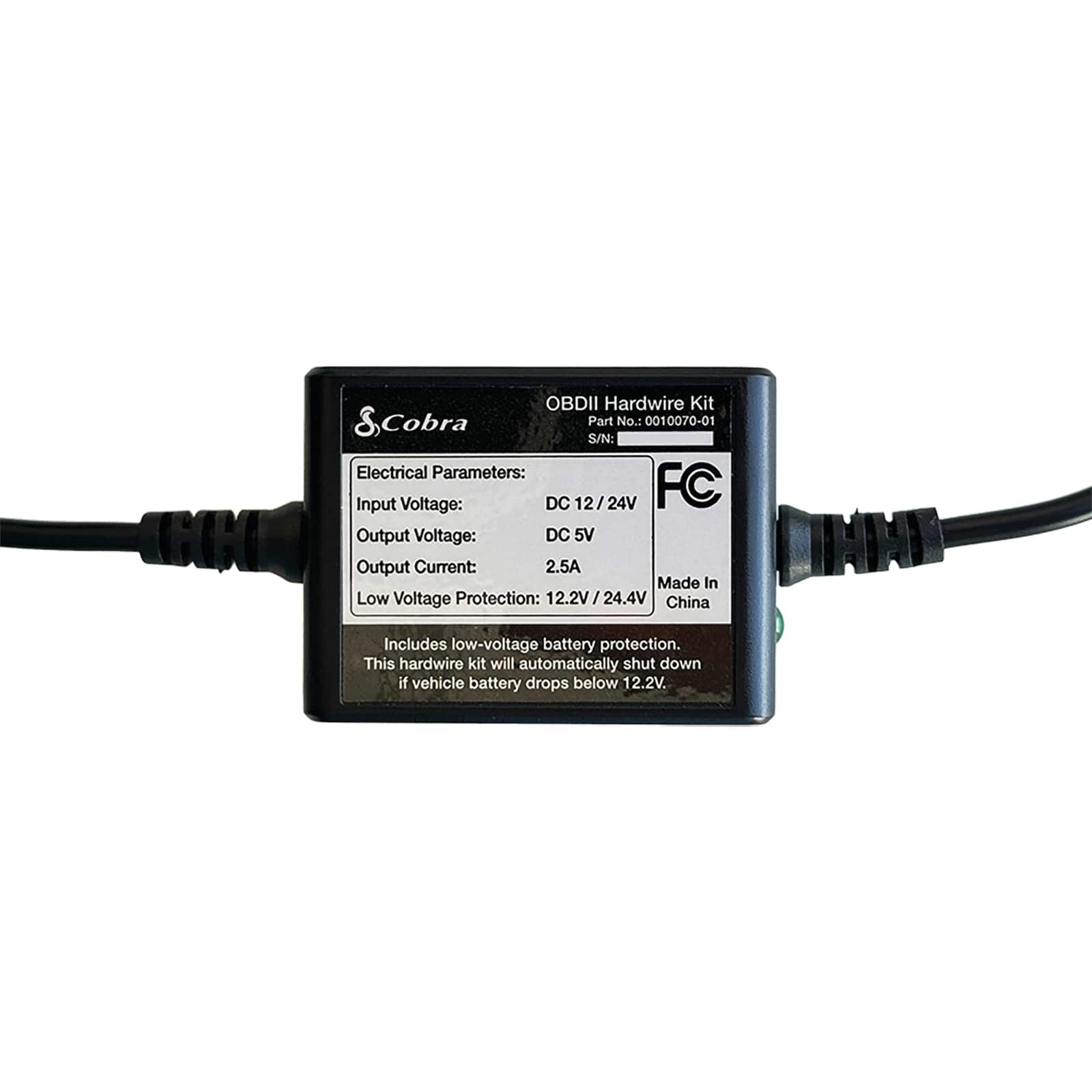 The text on the image is grouped and corrected as follows:
"IHK OBDII Hardwire Kit & Cobra Part No.: 0010070-01 S/N: Electrical Parameters: Input Voltage: DC 12/24V FC Output Voltage: DC 5V Output Current: 2.5A Made In Low Voltage Protection: 12.2V/24.4V China INNI Includes low-voltage battery protection. This hardwire kit will automatically shut down if vehicle battery drops below 12.2V."