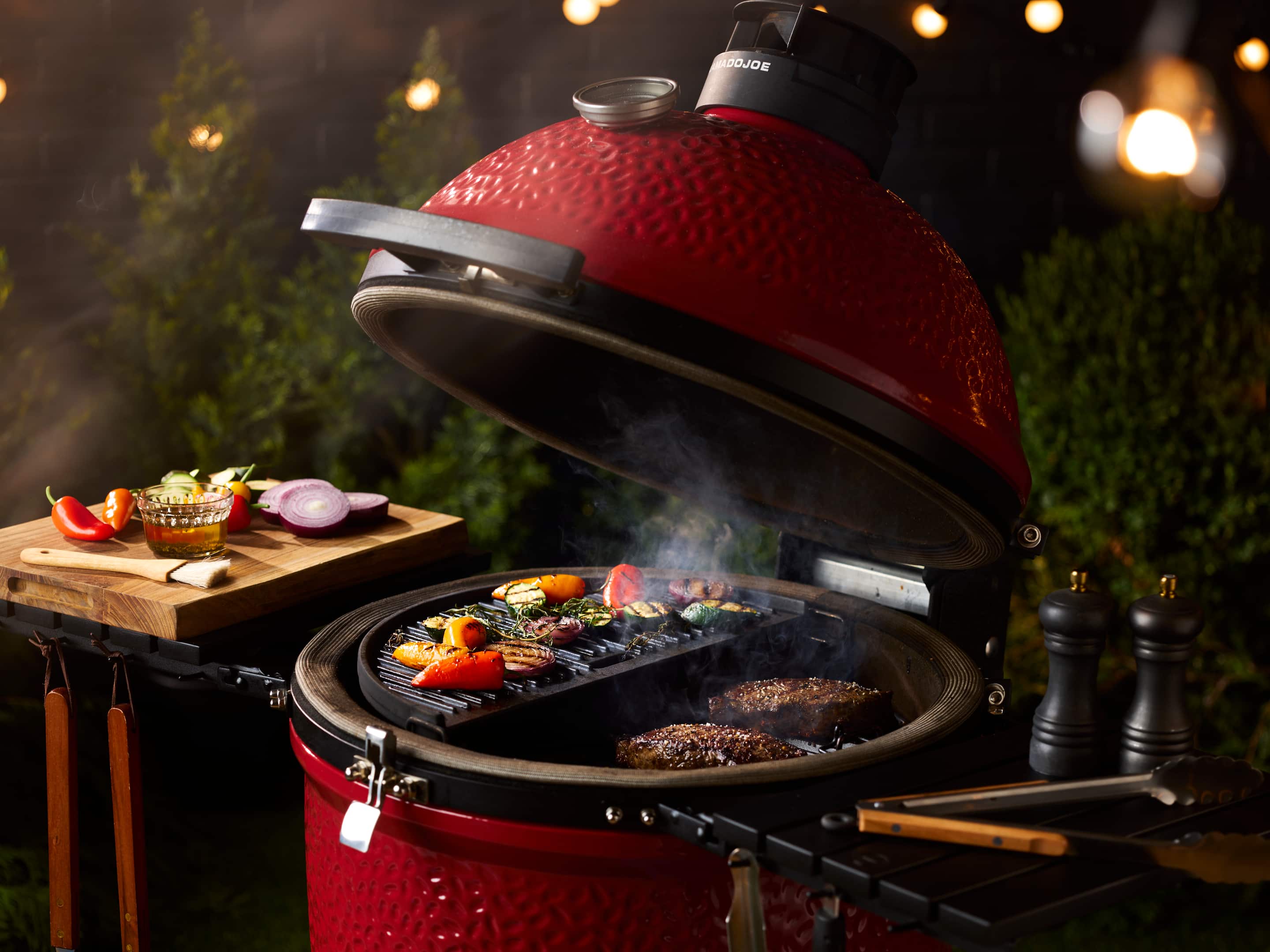Alt View 13. KAMADO JOE - CLASSIC JOE III Charcoal Grill with cart and locking wheels - Blaze Red.