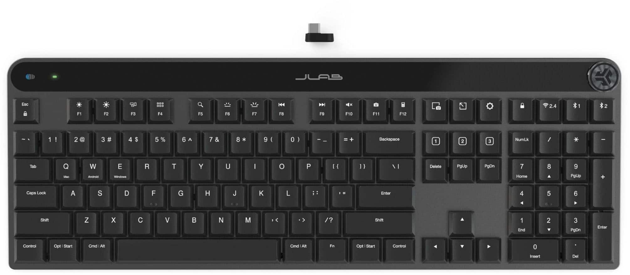 The image shows a black keyboard with a white background. The keyboard has a number pad and a set of function keys. The function keys are labeled with their corresponding numbers, such as F1, F2, F3, and so on. The keyboard also has a set of arrow keys, including up, down, left, and right. Additionally, there are other keys such as the backspace key, the enter key, and the control key. The keyboard is designed for use with Android and Windows operating systems.