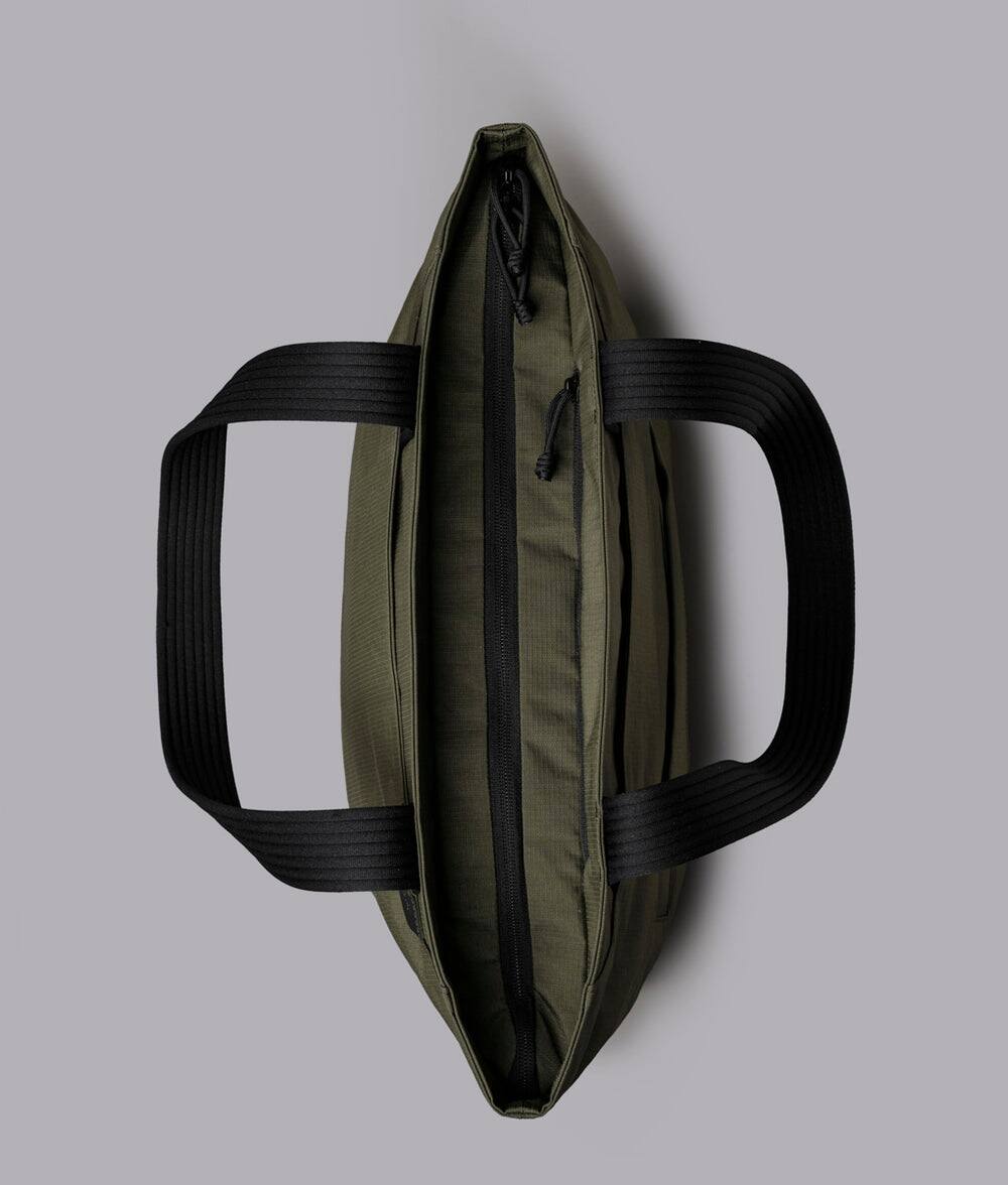 Alt View 9. ALPAKA - Flight Tote (L) Laptop Tote Bag for Work, Large Tote Bag Fits 16" MacBook Pro, Water Bottle Pocket, Luggage Pass-Through - Green Axoflux 400D.