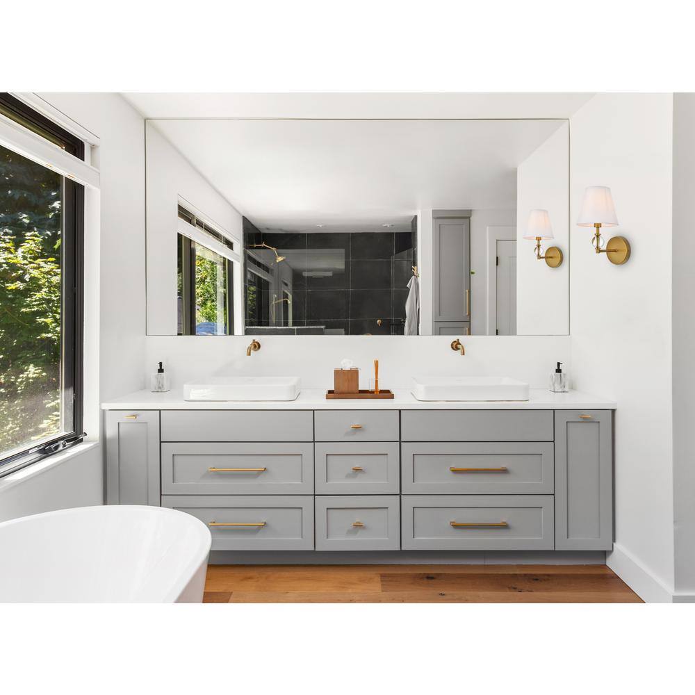 Angle. Living District - Bethany 1 light bath sconce in brass with white fabric shade - Brass And White Fabric Shade.