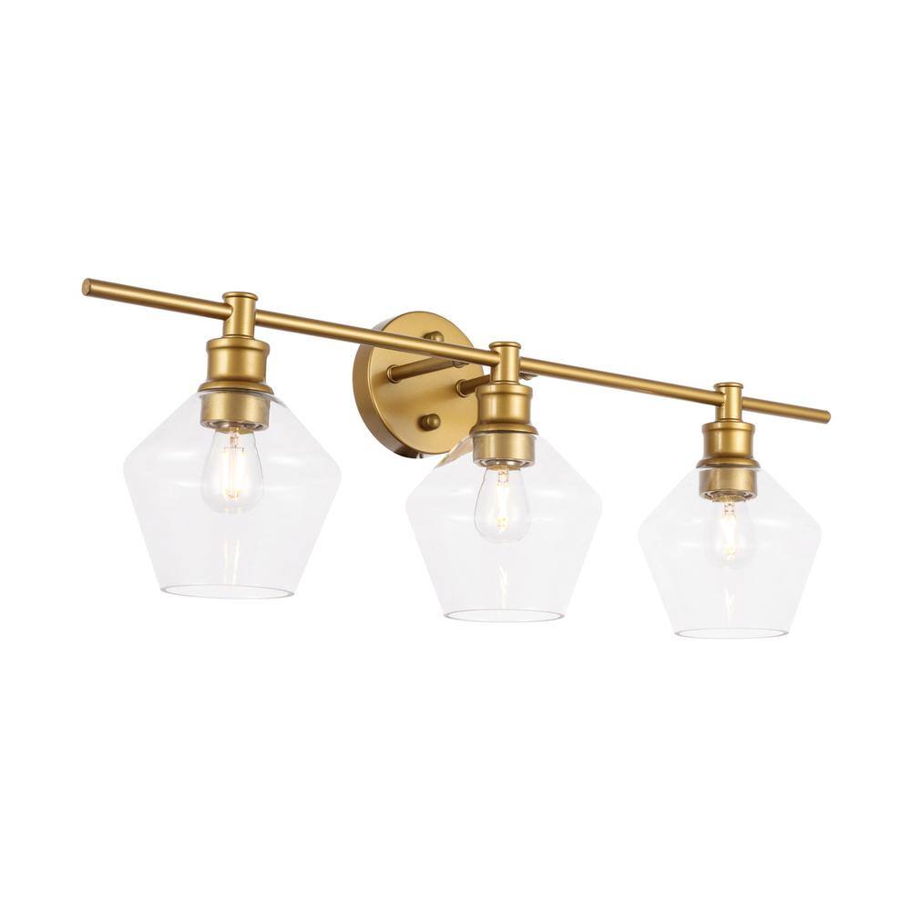 Angle. Living District - Gene 3 light Brass and Clear glass Wall sconce - Brass And Clear Glass.