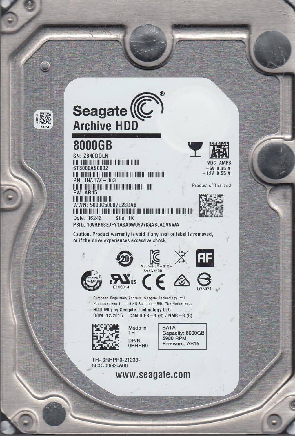 Seagate Archive HDD  
8000GB  
SN: Z840DDLN  
ST8000AS0002  
PN: 1NA17Z-003  
FW: AR15  
WWN: 5000C50087E28DA8  
Date: 16242  
Site: TK  
PSID: 16VRP6SEJFY1ASA9W05V7K4ABJAQVNWA  

Caution. Product warranty is void if any seal or label is removed, or if the drive experiences excessive shock.  

VDC AMPS  
+5V 0.35 A  
+12V 0.55 A  

Product of Thailand  

European Regulatory Address:  
Seagate Technology Int'l  
Koolhovenlaan 1, 1119 NE Schiphol-Rijk, The Netherlands  

HDD Mfg by Seagate Technology LLC  
DOM: 12/2015  
CAN ICES-3 (B) / NMB (B)  

Made in TH  

DP/N ORHPR0-21233-5CC-
