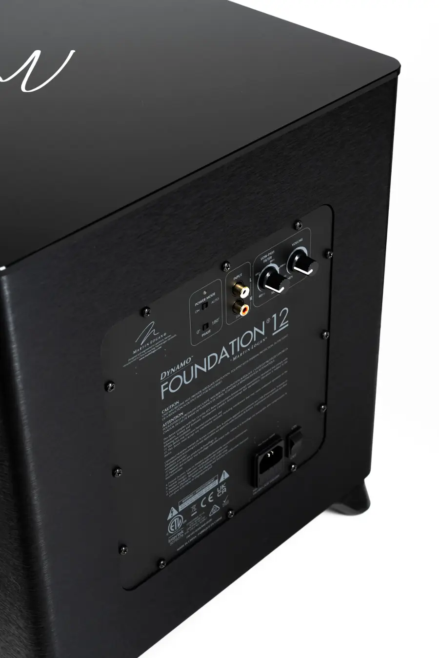 The text on the image reads: "N Foundation 12 - 8 Ohm - Autoformer - 180 Watts - Martin Logan - Dynamo - Attention: Please read the instruction manual before using this equipment."