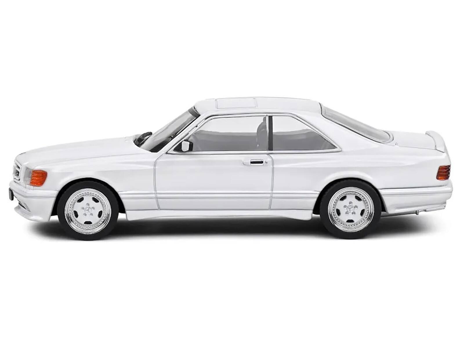 Angle. Solido - 1990 Mercedes-Benz 560 SEC AMG WideBody Classic White 1/43 Diecast Model Car by Solido - White.