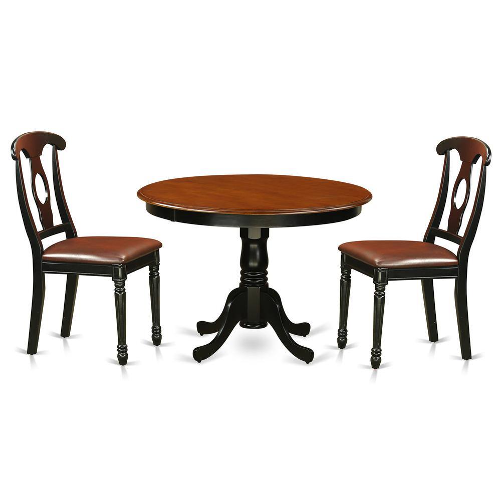 Angle. East West Furniture - 3 Pc set with a Round Dinette Table and 2 Leather Kitchen Chairs in Linen White - Black.