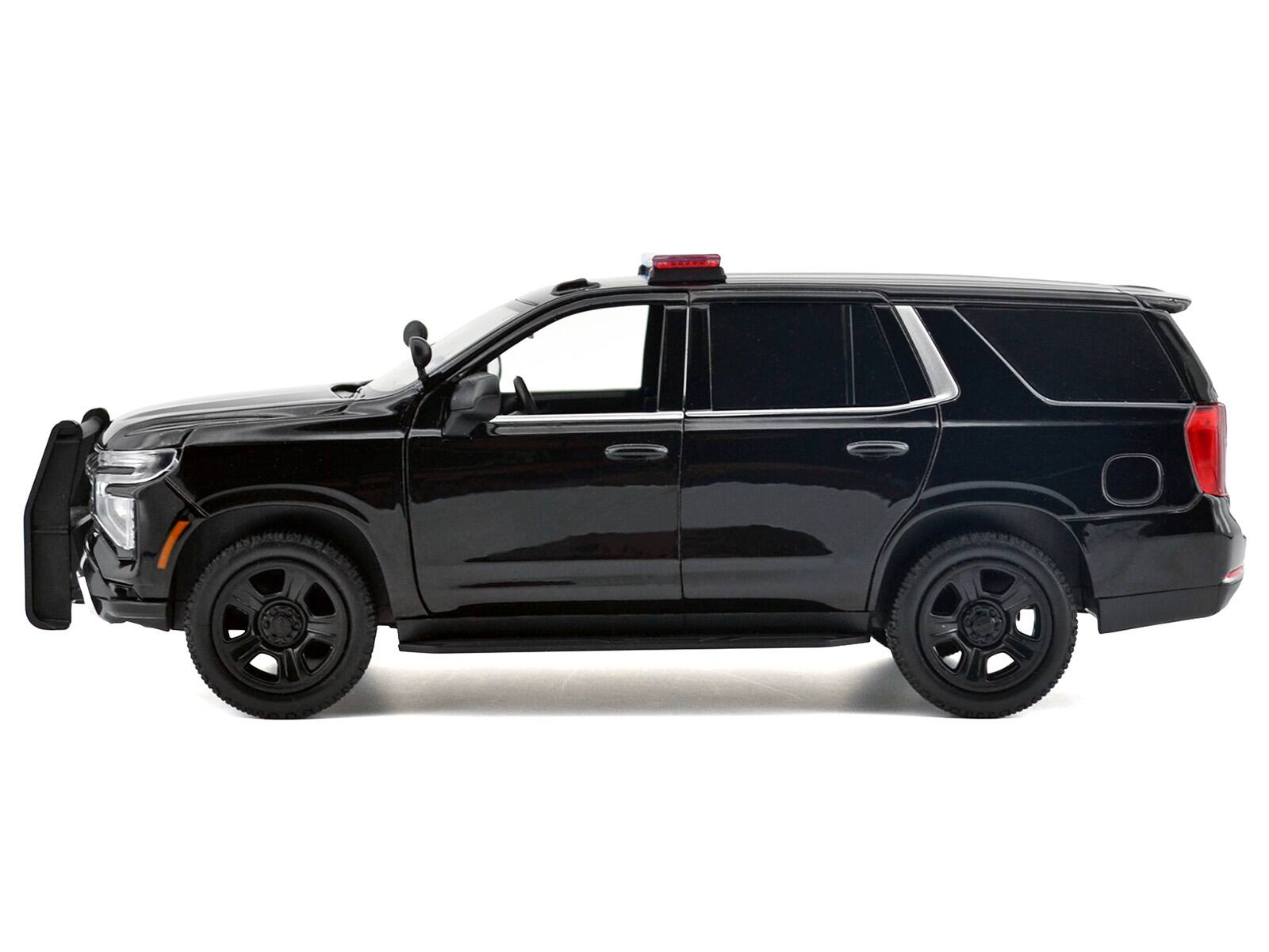 Left. Motormax - 2025 Chevrolet Tahoe PPV Black "Custom Builder's Kit - Law Enforcement and Public Service" Series 1/24 - Black.